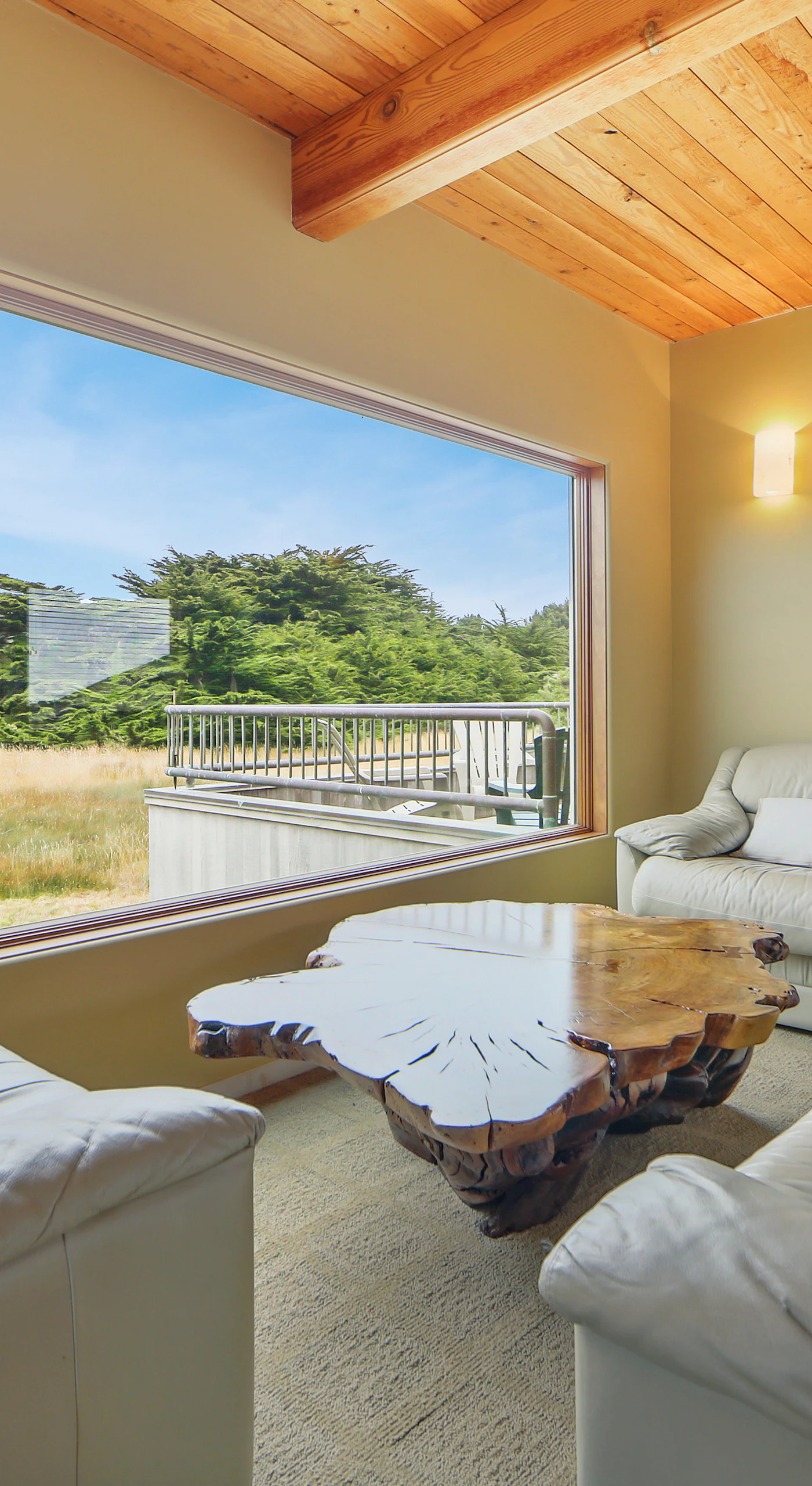Morning light fills this second living area, providing the perfect spot to relax with a book or catch up with loved ones.