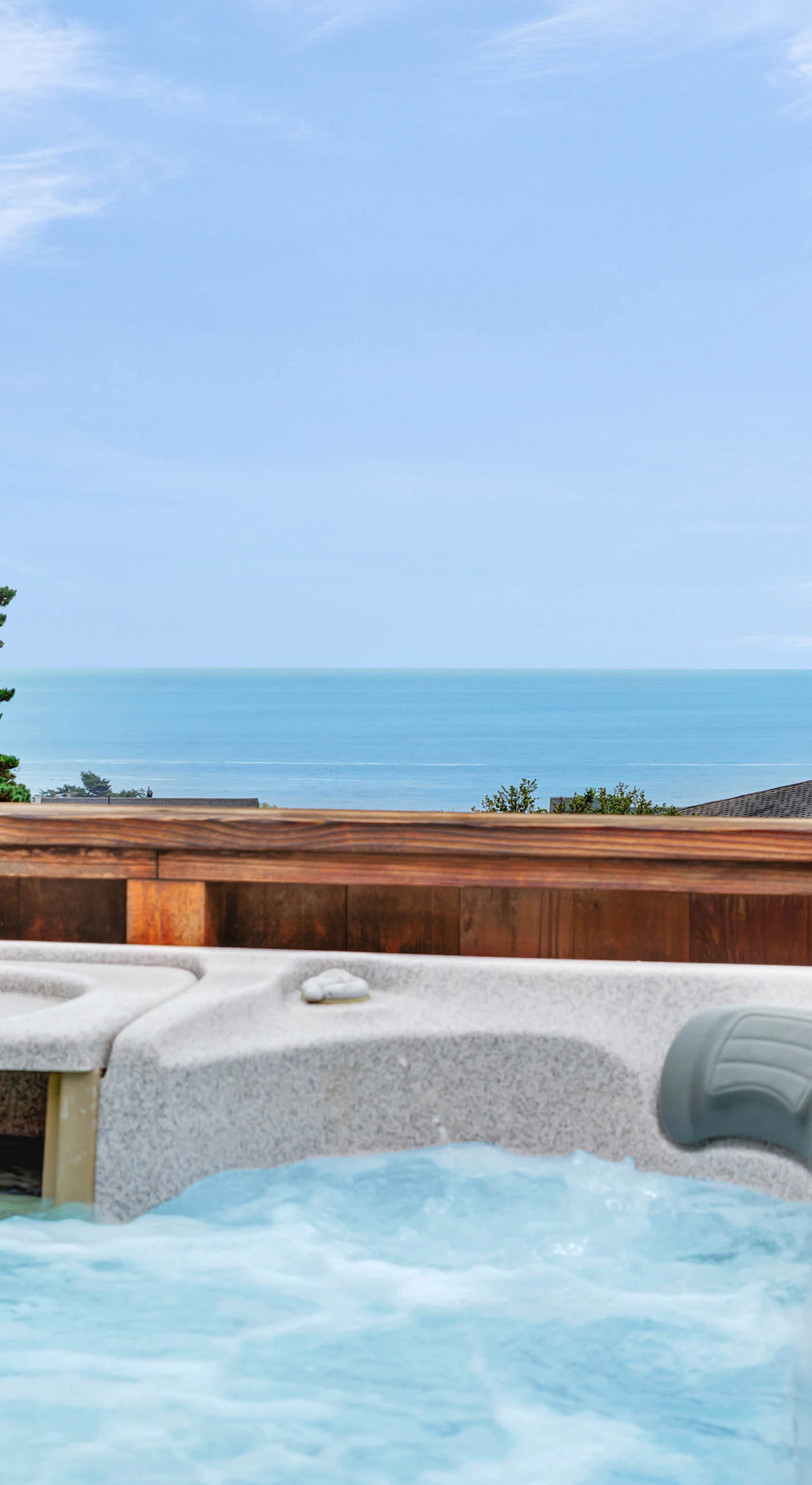 Soak in the private hot tub with the sound of waves and sea breezes, the perfect way to unwind after a day of exploration.