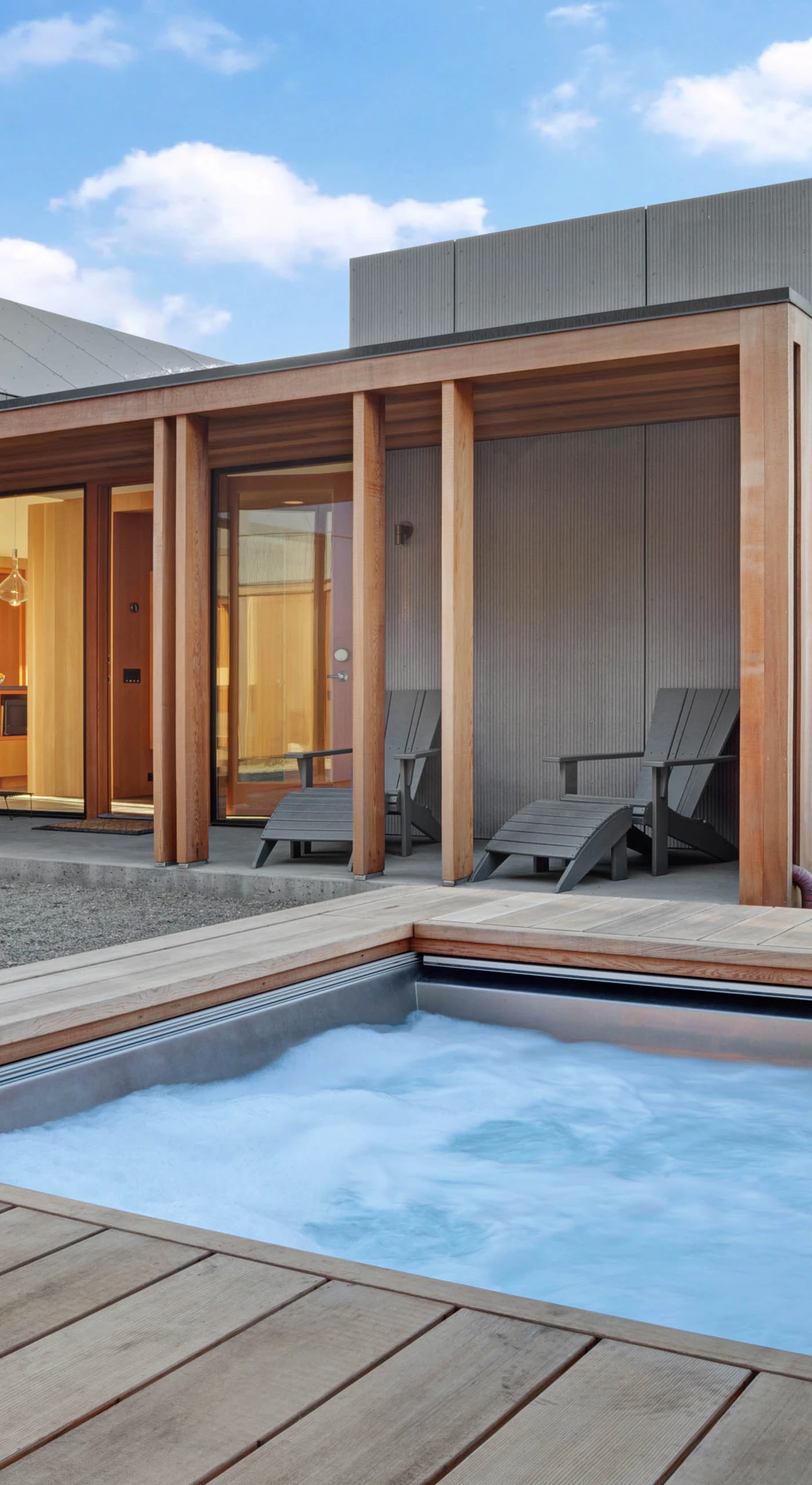 Step into relaxation in your private hot tub, where you can unwind under the stars after a day of coastal adventures.