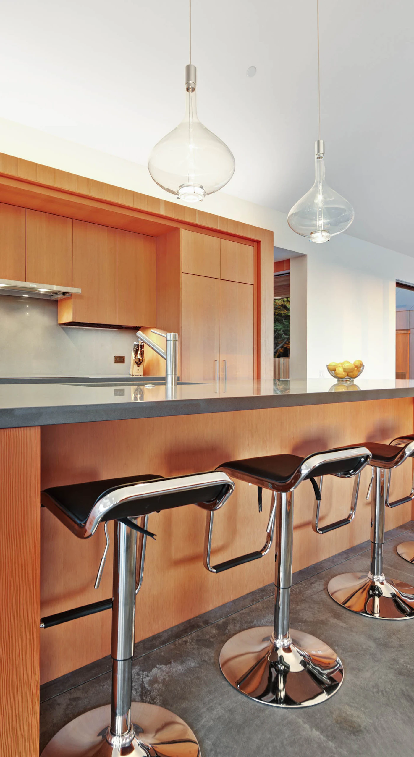 Your culinary adventures await in this modern kitchen, designed for both efficiency and style, with ample space for meal prep.