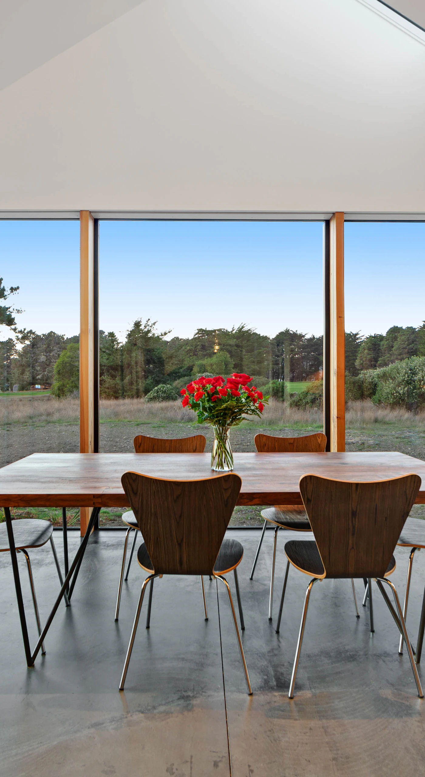 Imagine sharing meals with loved ones at this dining table, surrounded by panoramic views that inspire conversation and laughter.