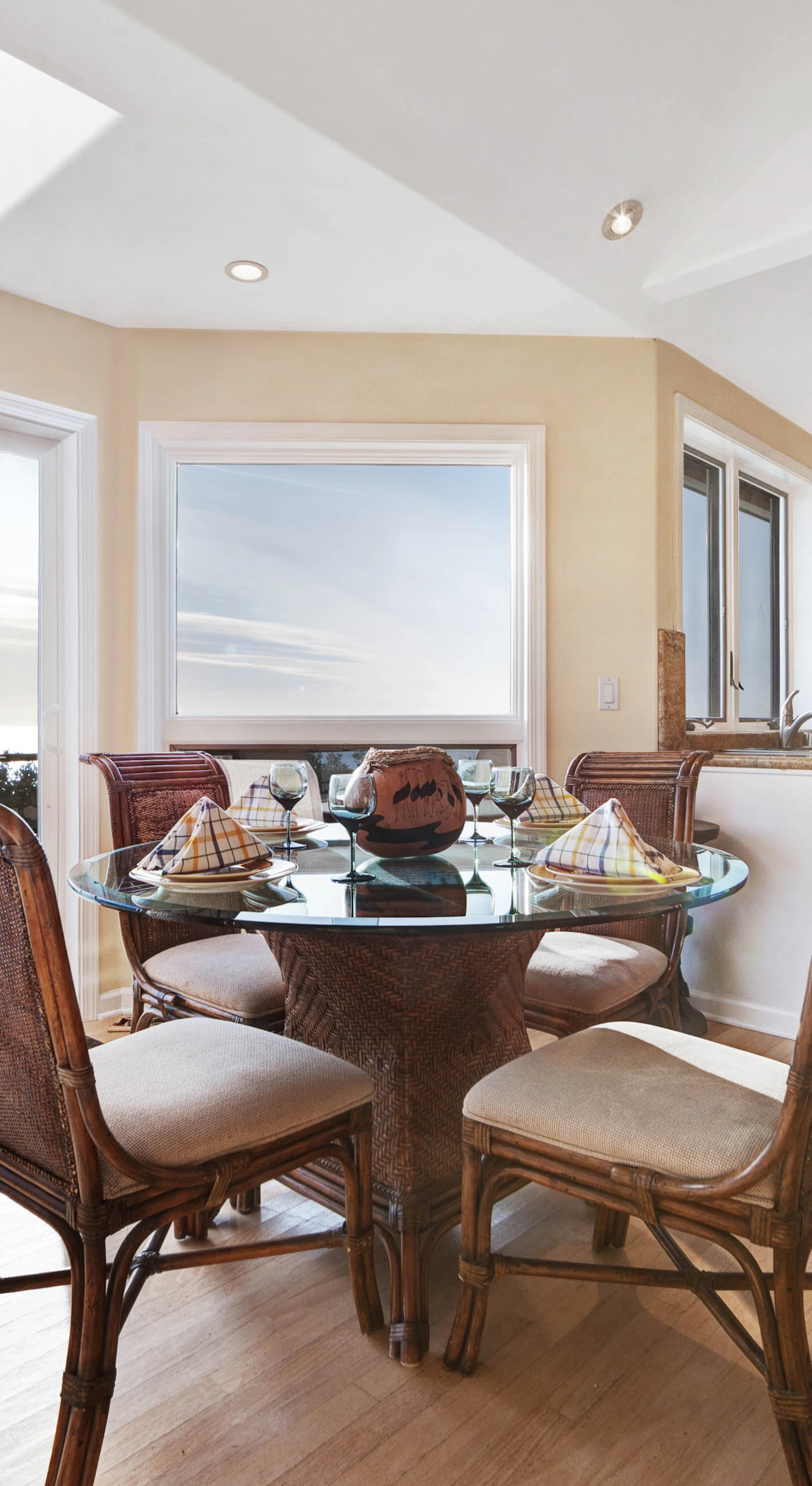 Dine with a view as you savor meals at the glass-topped table, where every bite is complemented by the beauty of the ocean.