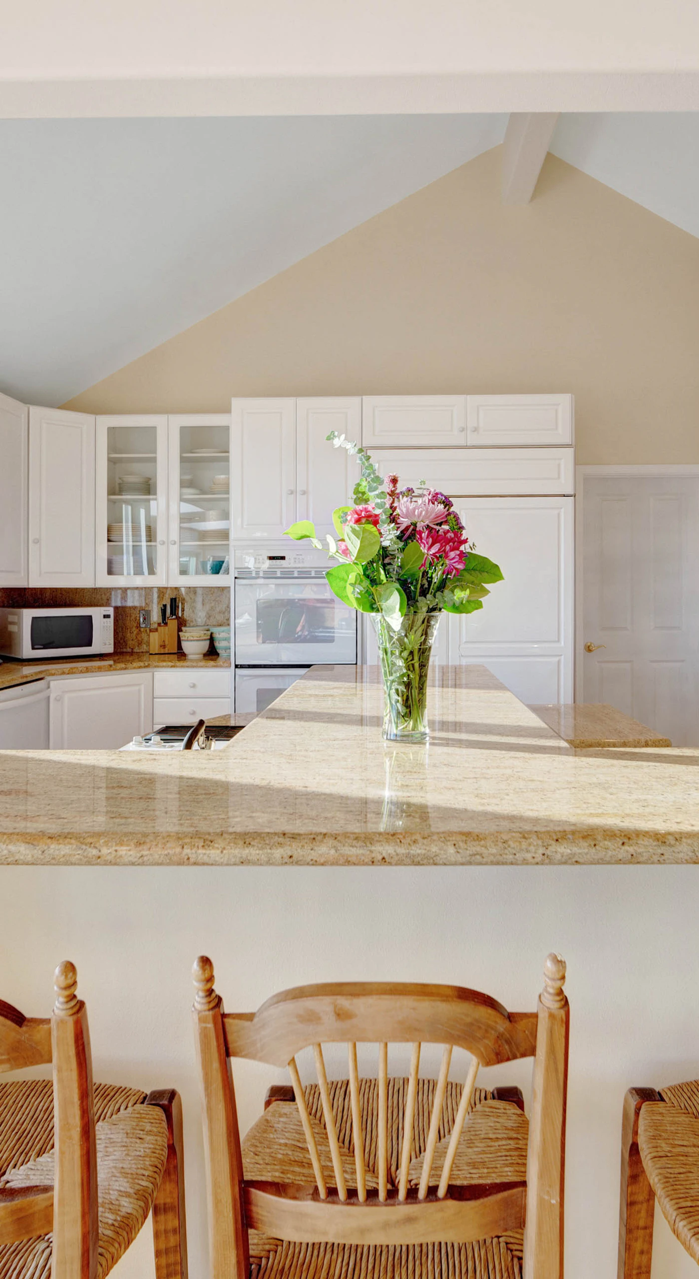 Cook up your favorite meals in the well-appointed kitchen while taking in the gorgeous coastal scenery outside.