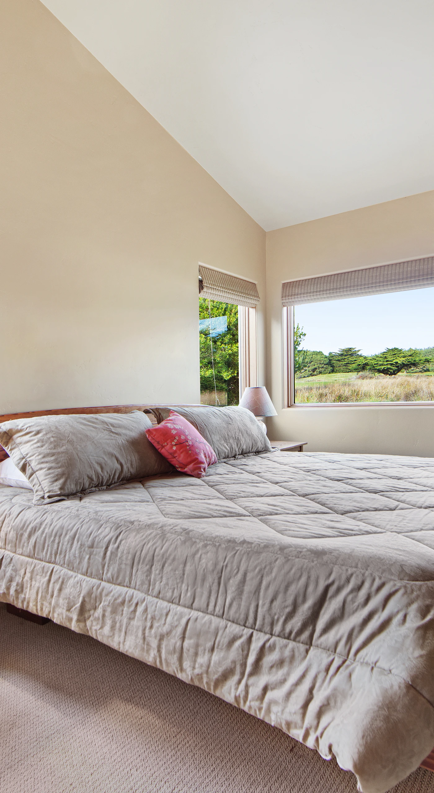 Wake up in the tranquil primary bedroom, where serene views invite you to start your day in peace and comfort.