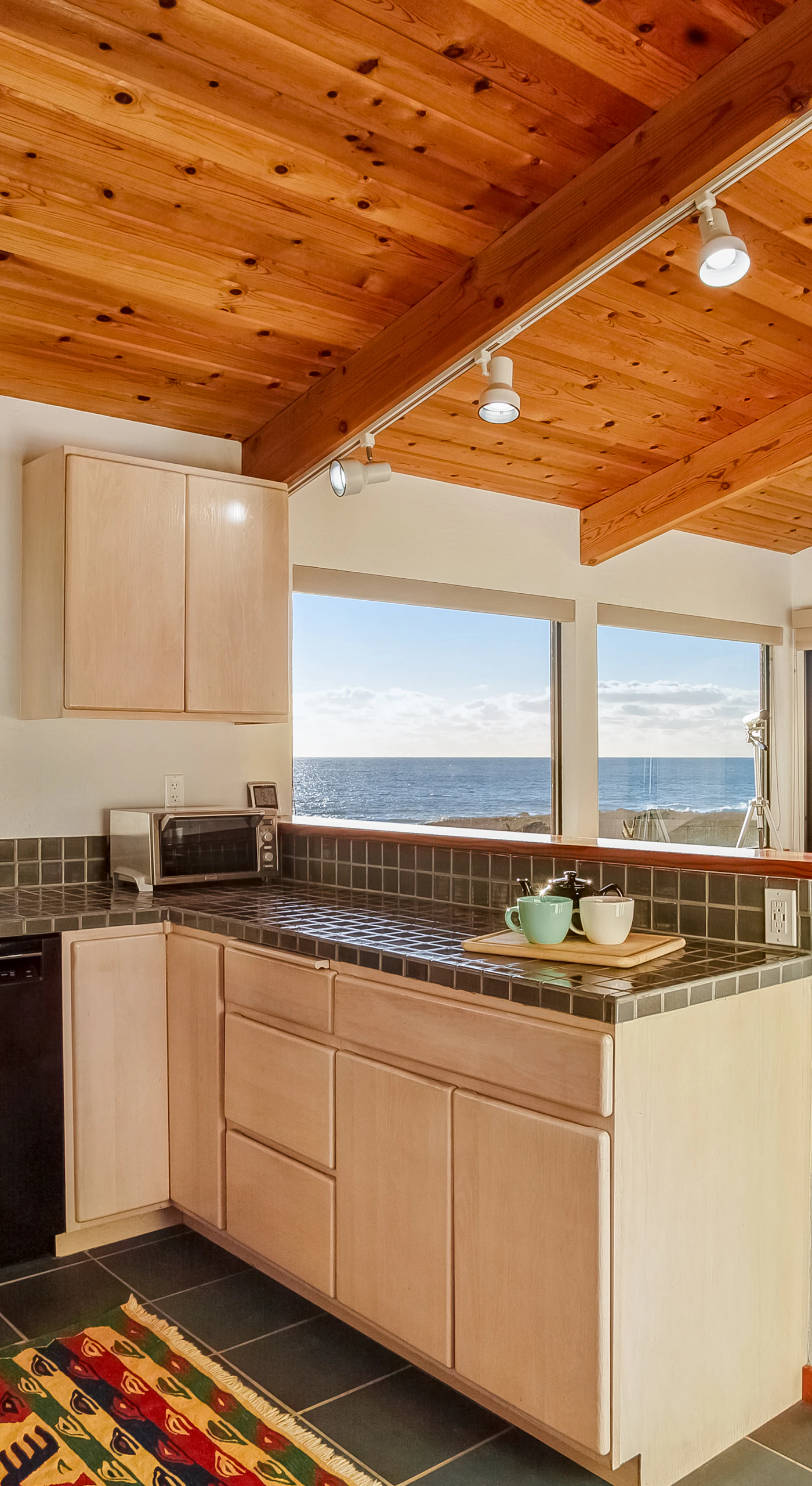 Your culinary adventures begin in this well-equipped kitchen, where ocean vistas inspire you to create delicious meals for family and friends.