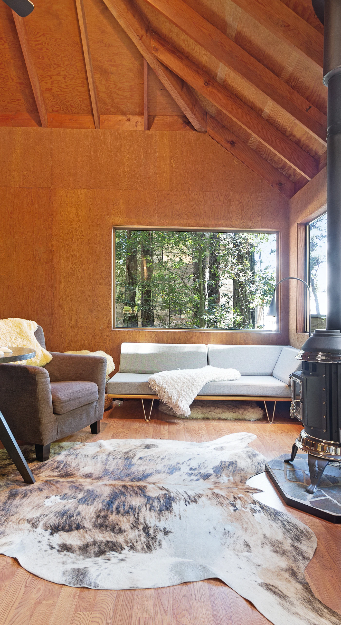 The warm glow of the gas fireplace creates a cozy atmosphere in the living room, inviting you to curl up with a good book or share stories with loved ones.