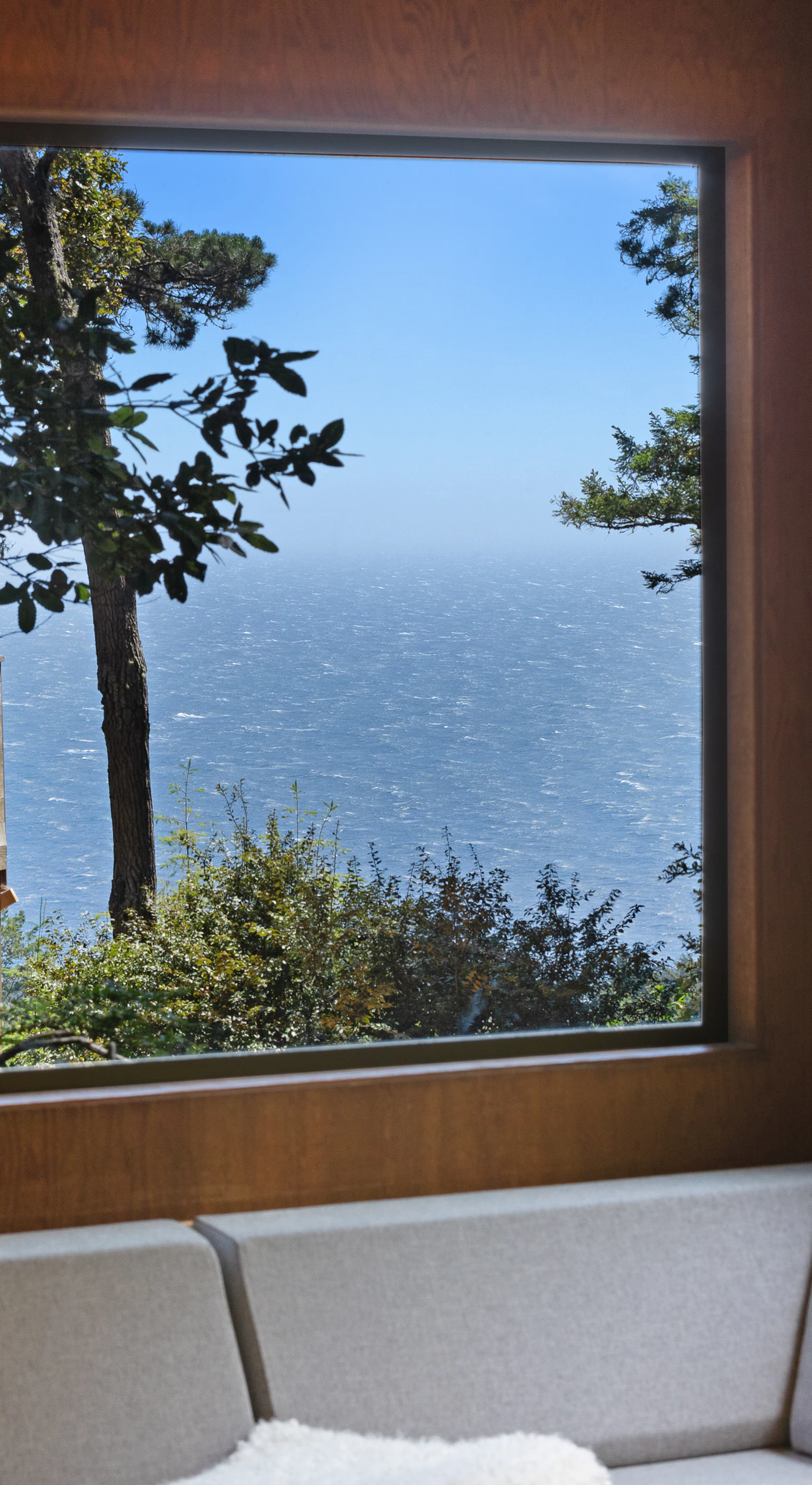 Gaze at the stunning ocean view from your cozy retreat, where every moment feels like a serene escape into nature.