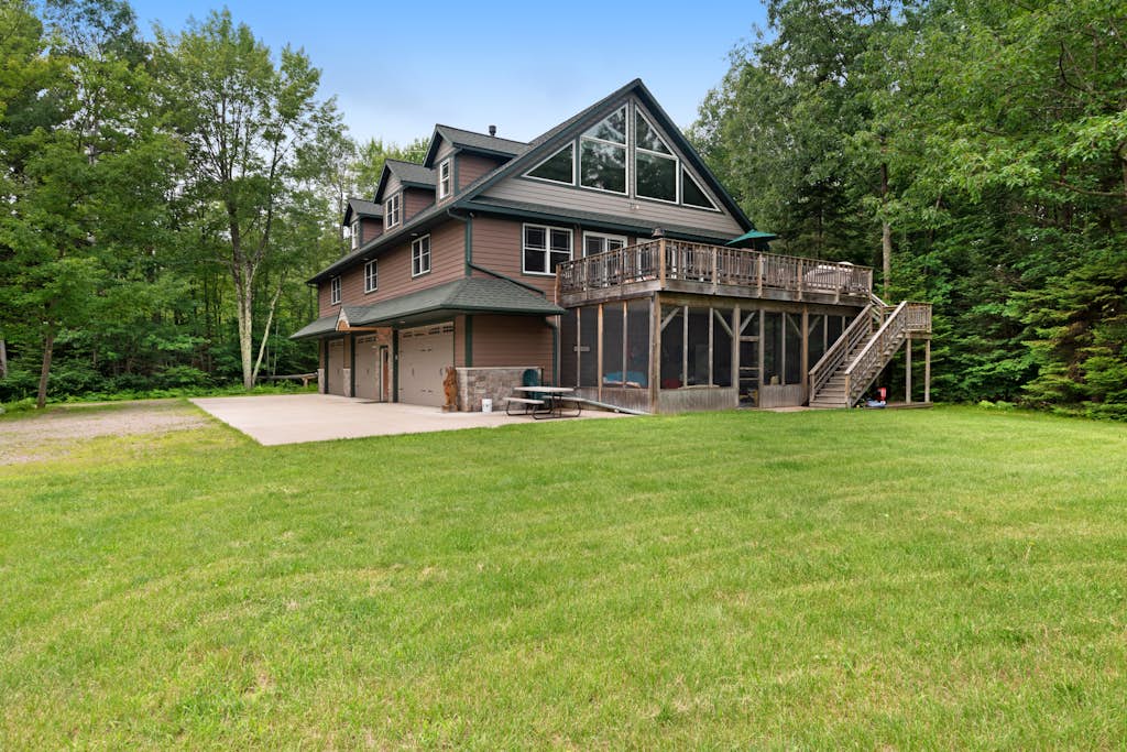 Large, waterfront home with a full kitchen, dock, canoes, & outdoor firepit