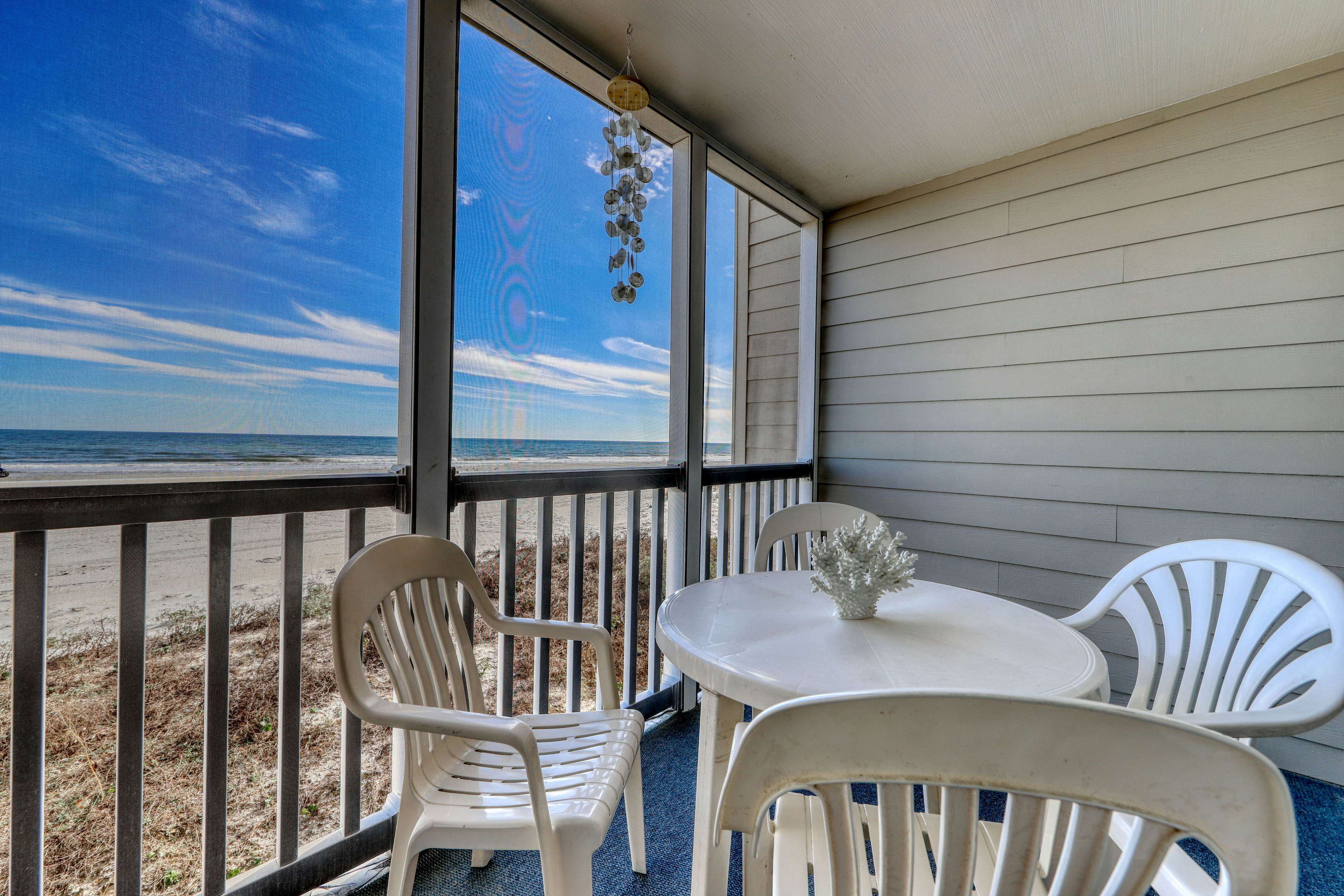 Pelicans Watch 106 On the Beach