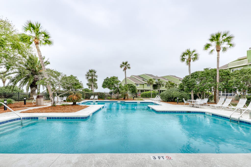Three-story ocean-view villa with pool, balcony, charcoal grill, & central AC — Isle of Palms, SC — vacation rental