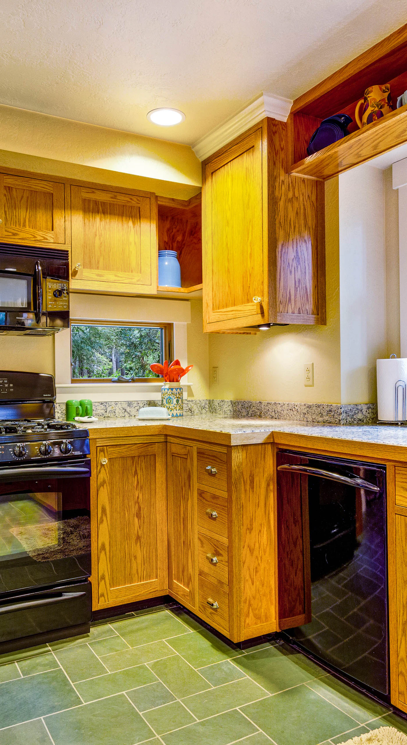 Embrace your inner chef in this kitchen, where every meal becomes a delightful experience amid warm wooden accents.