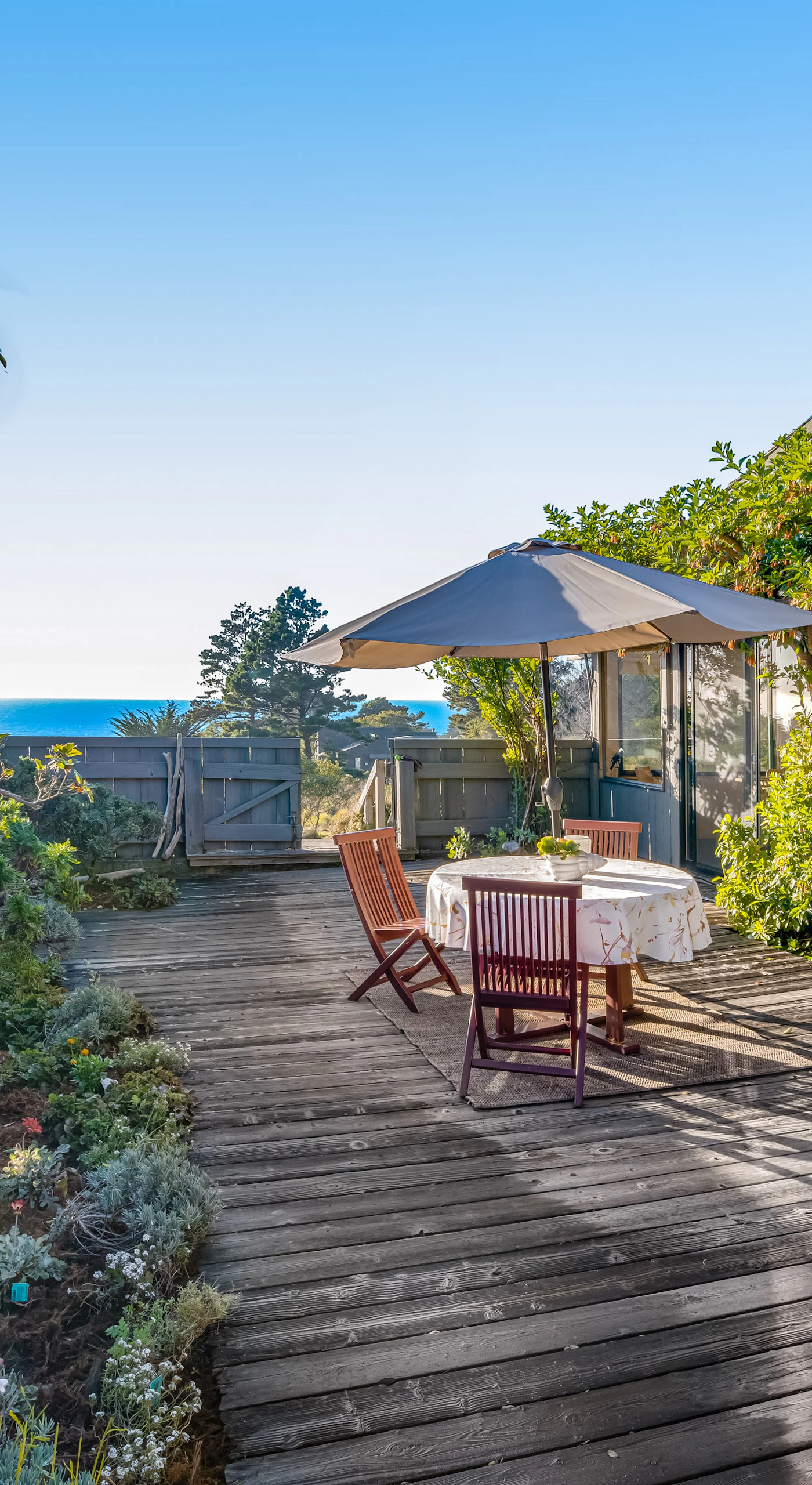 Your outdoor dining experience awaits on the spacious deck, where ocean views and fresh coastal air enhance every meal.