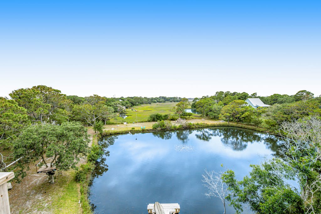 Fantastic coastal retreat with private dock, gas grill, two decks, & fast WiFi — Folly Beach, SC — vacation rental
