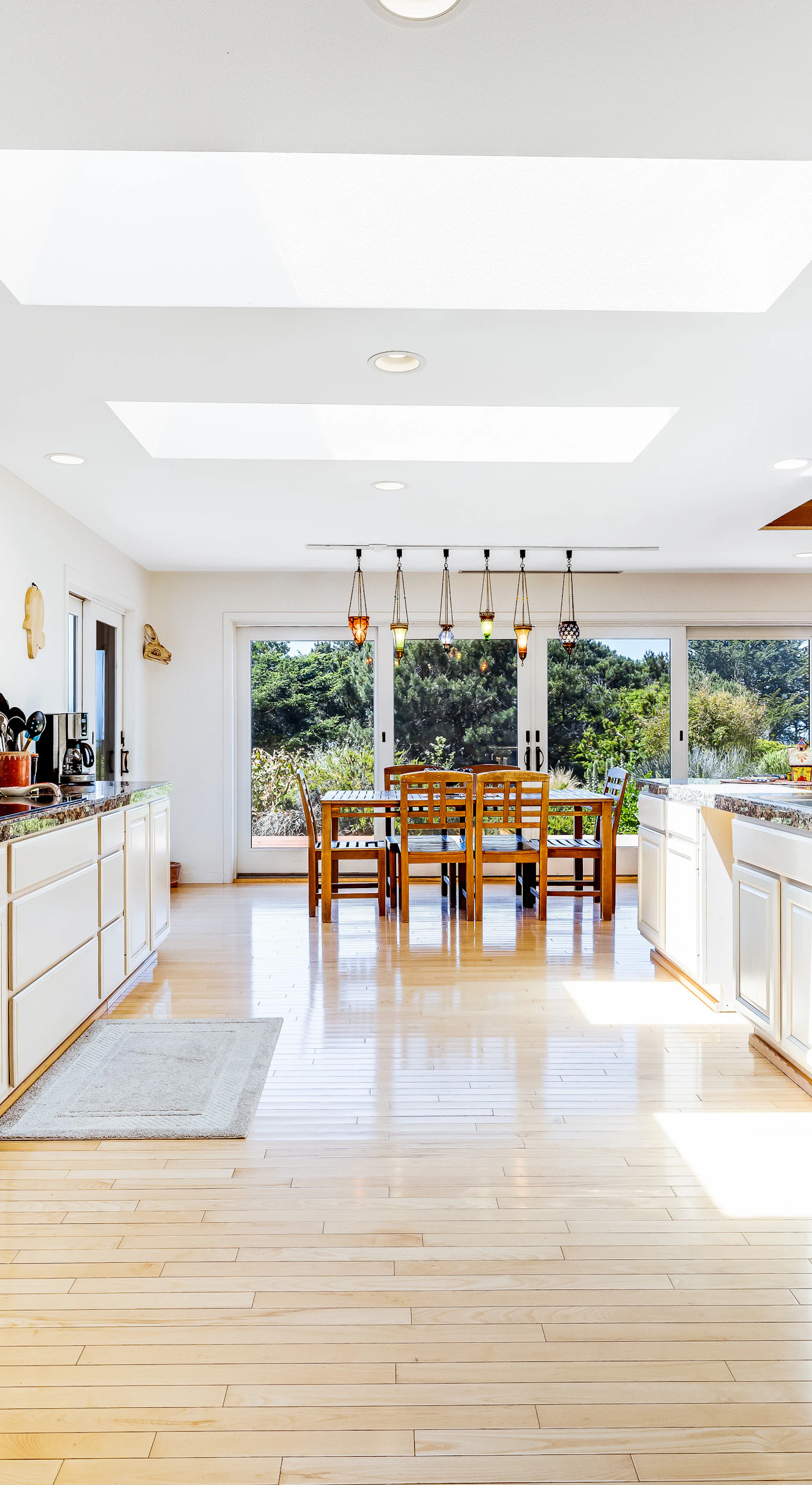 Experience the joy of meal prep in this bright kitchen, featuring ample counter space and a layout that encourages togetherness.