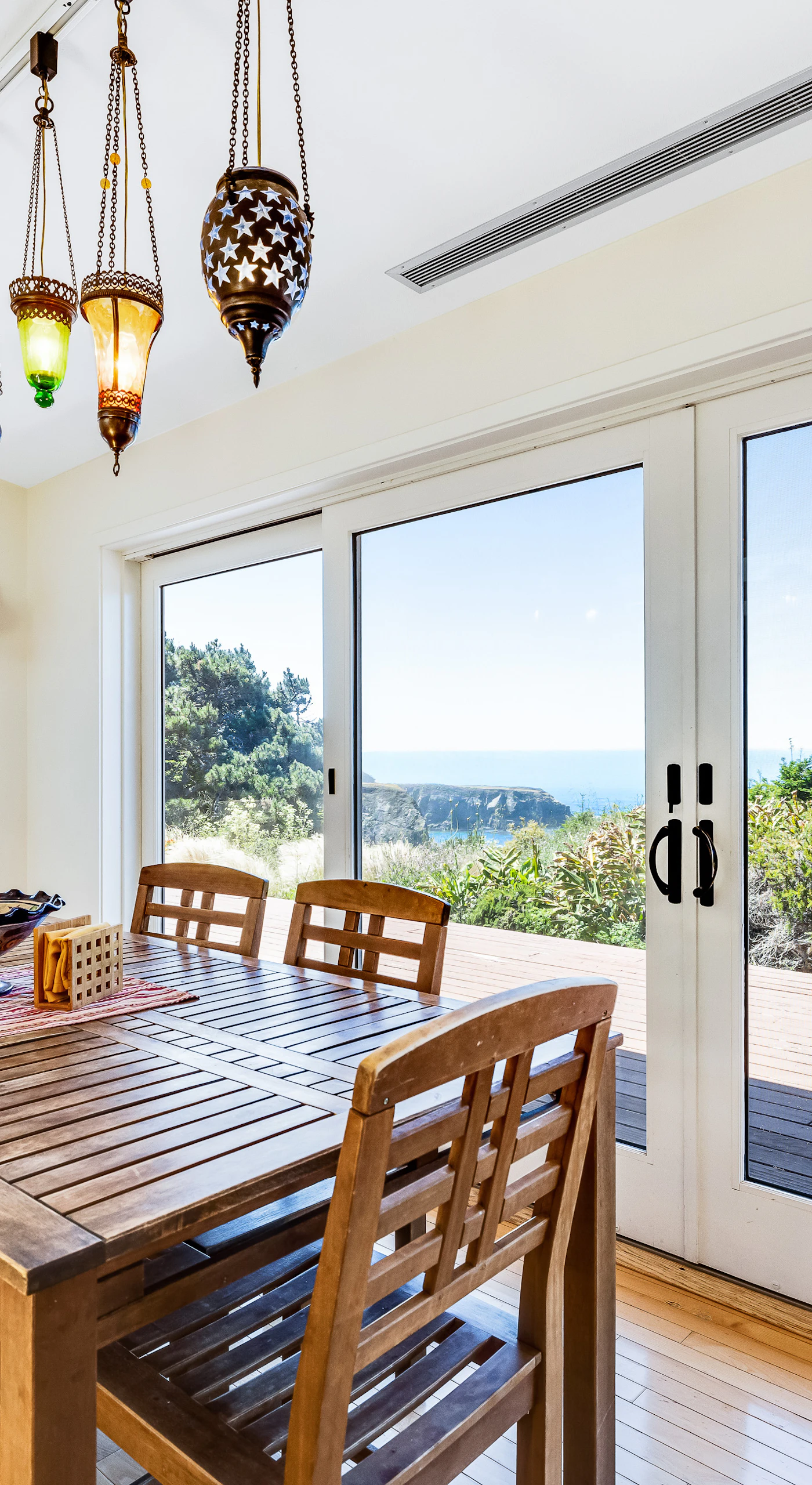 Picture yourself sipping morning coffee at this inviting dining space, where the serene atmosphere sets the stage for a relaxing day ahead.
