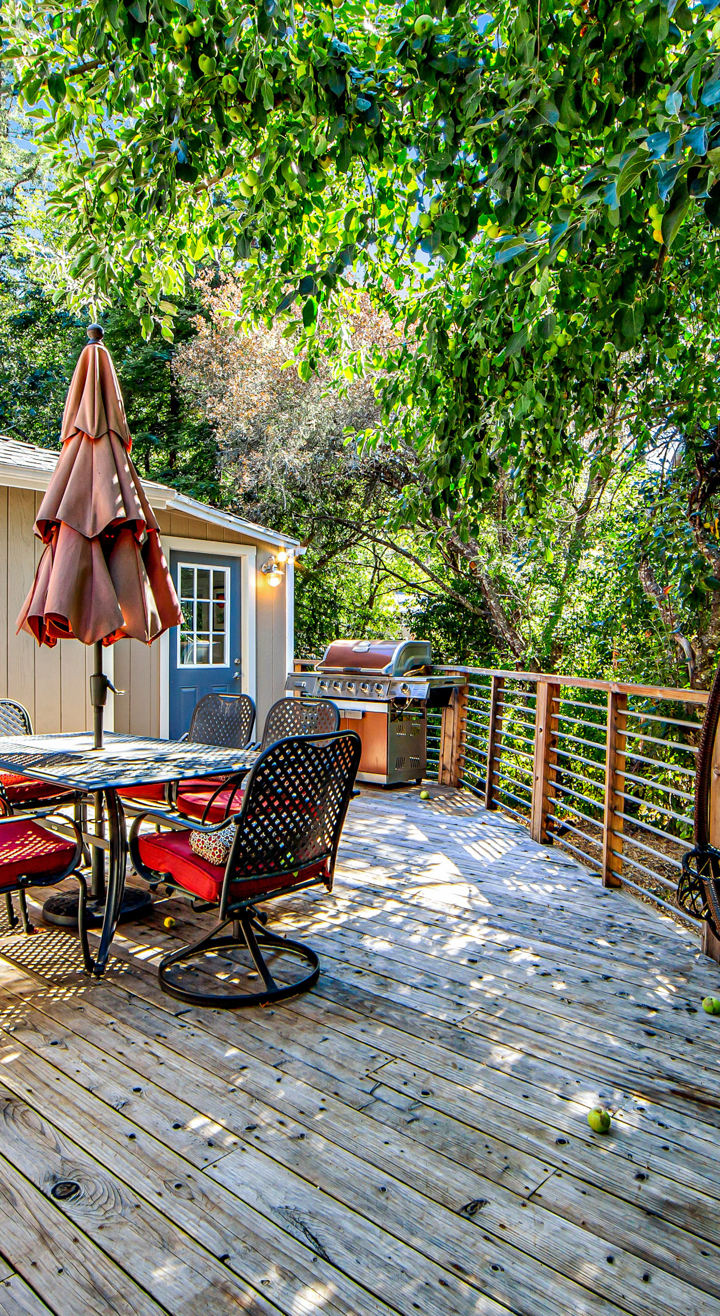 Lounge in the hanging egg chair or gather at the outdoor table — this deck was made for lazy wine country afternoons