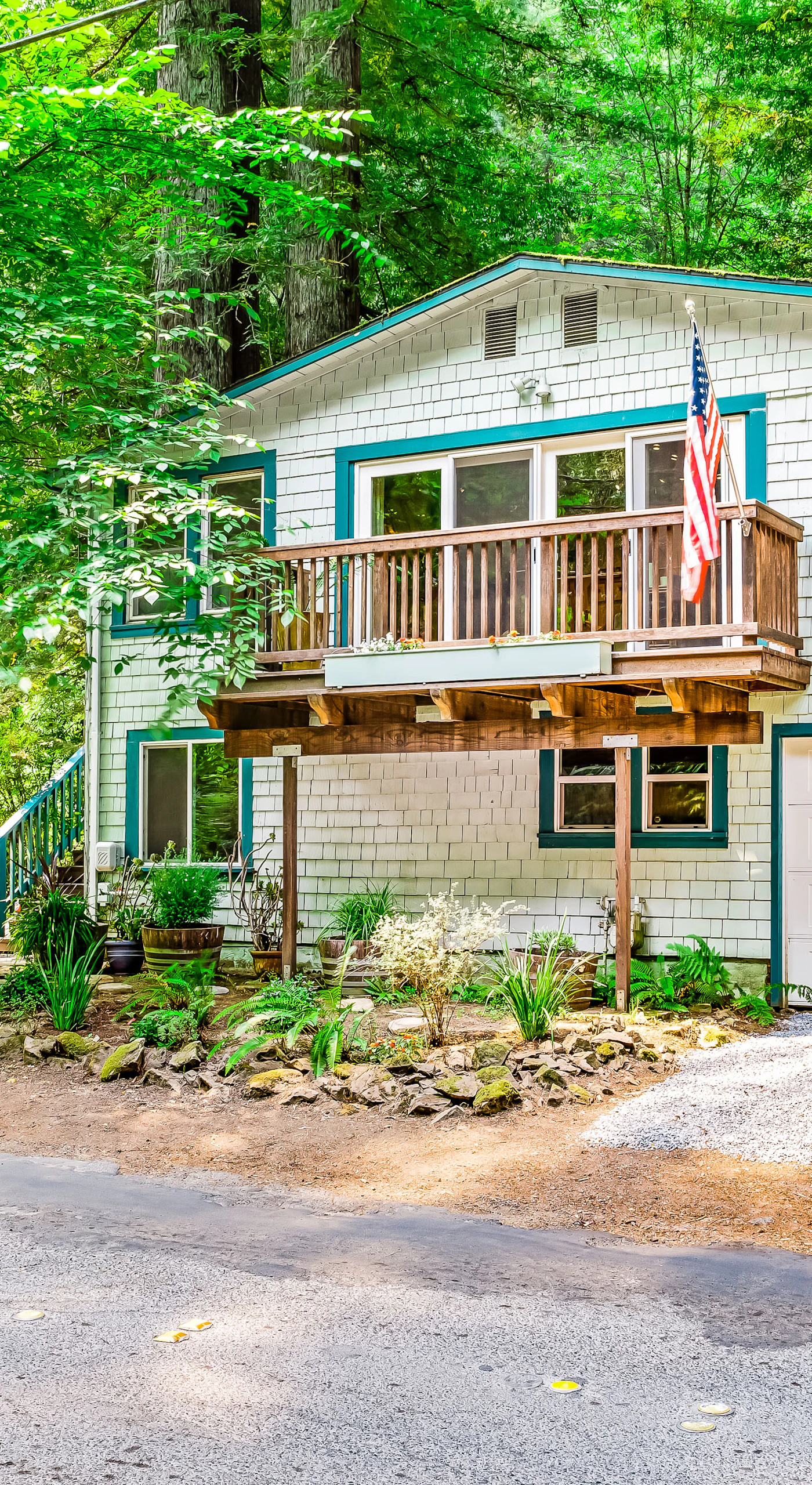Welcome to Creek House — your charming cottage hideaway tucked beneath towering trees in the heart of Guerneville, with a private balcony and easy driveway parking.