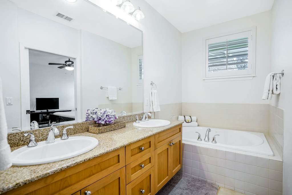 Master bathroom with double sinks, garden tub and walk in shower.