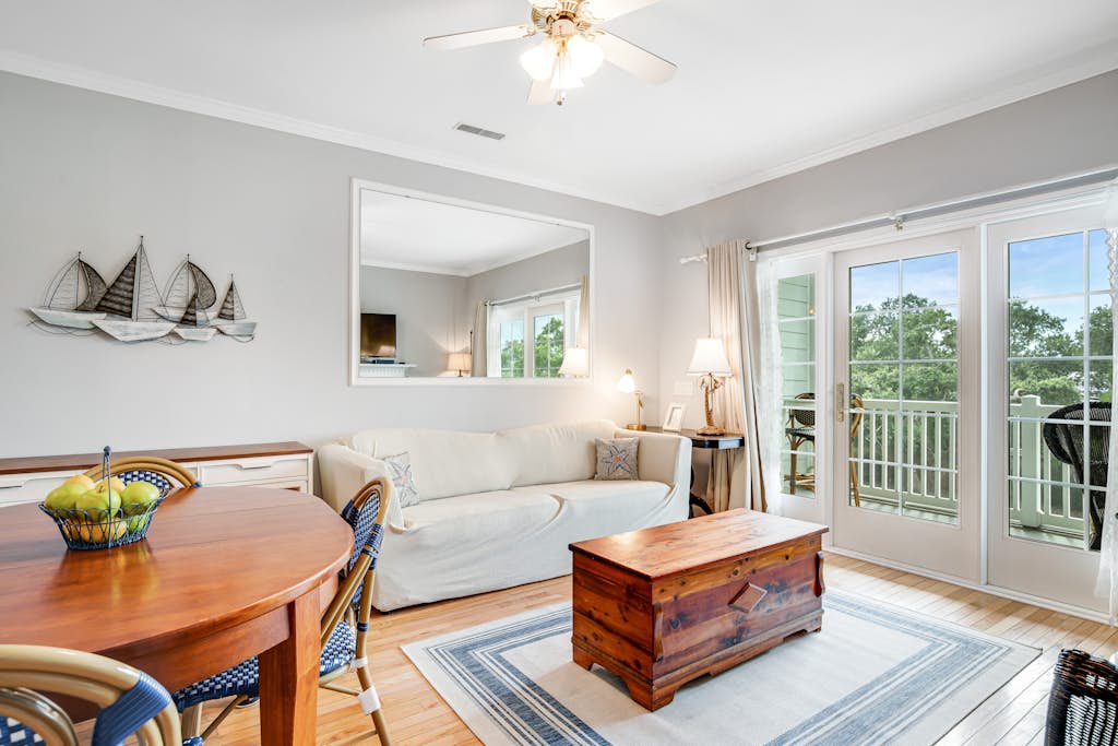 2nd-floor retreat with screened porch, shared pool, WiFi, central AC & elevator — Folly Beach, SC — vacation rental