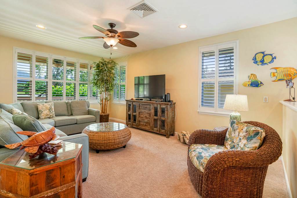Open living space with natural light and cozy furnishings