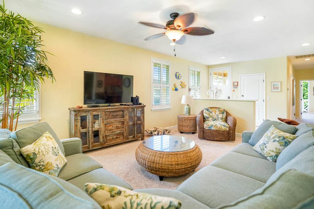 Bright living room with garden views and comfortable seating