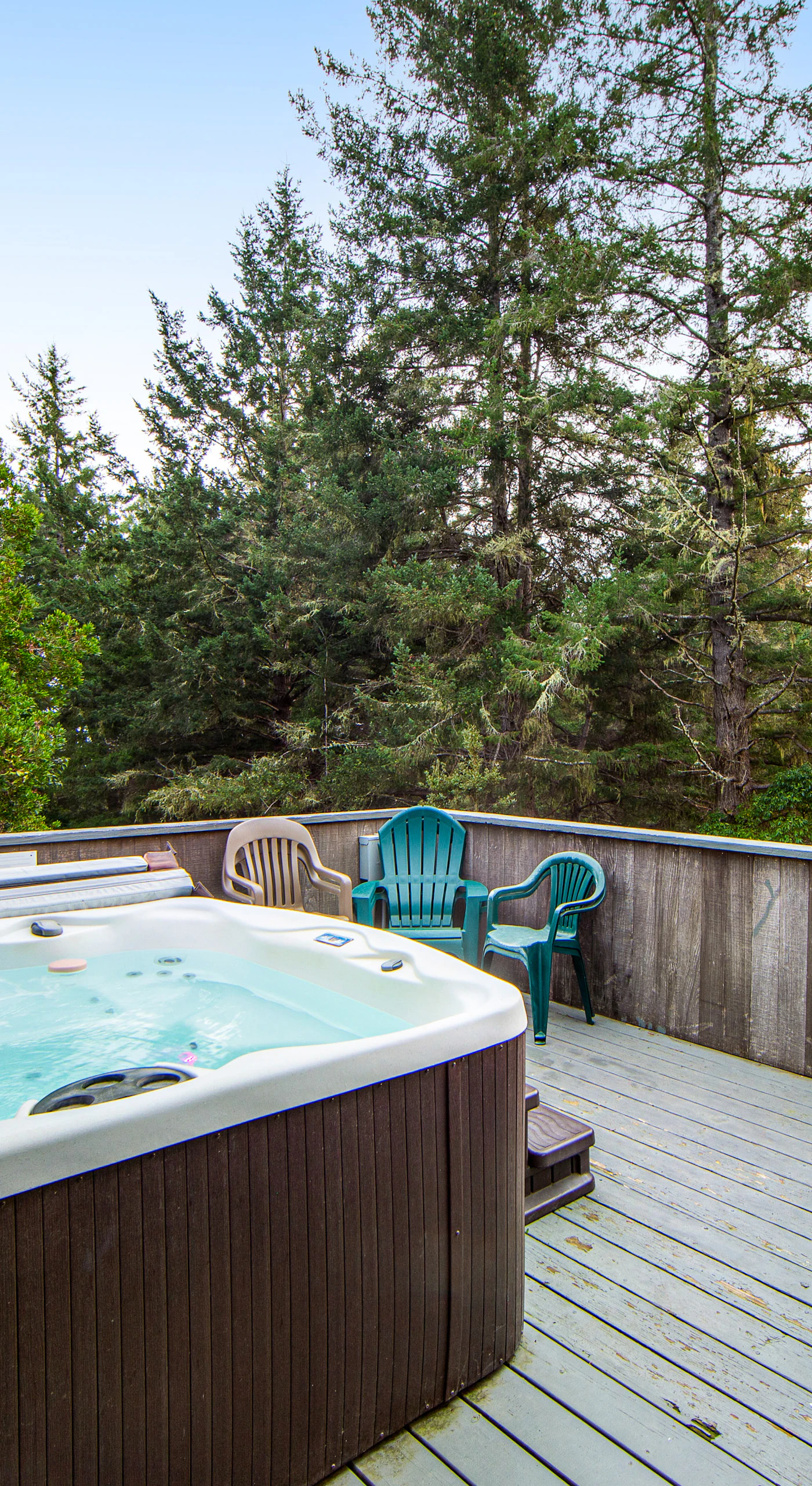 Soak under the stars in your private hot tub, surrounded by the serene sounds of nature, perfect for unwinding after a day of adventure.