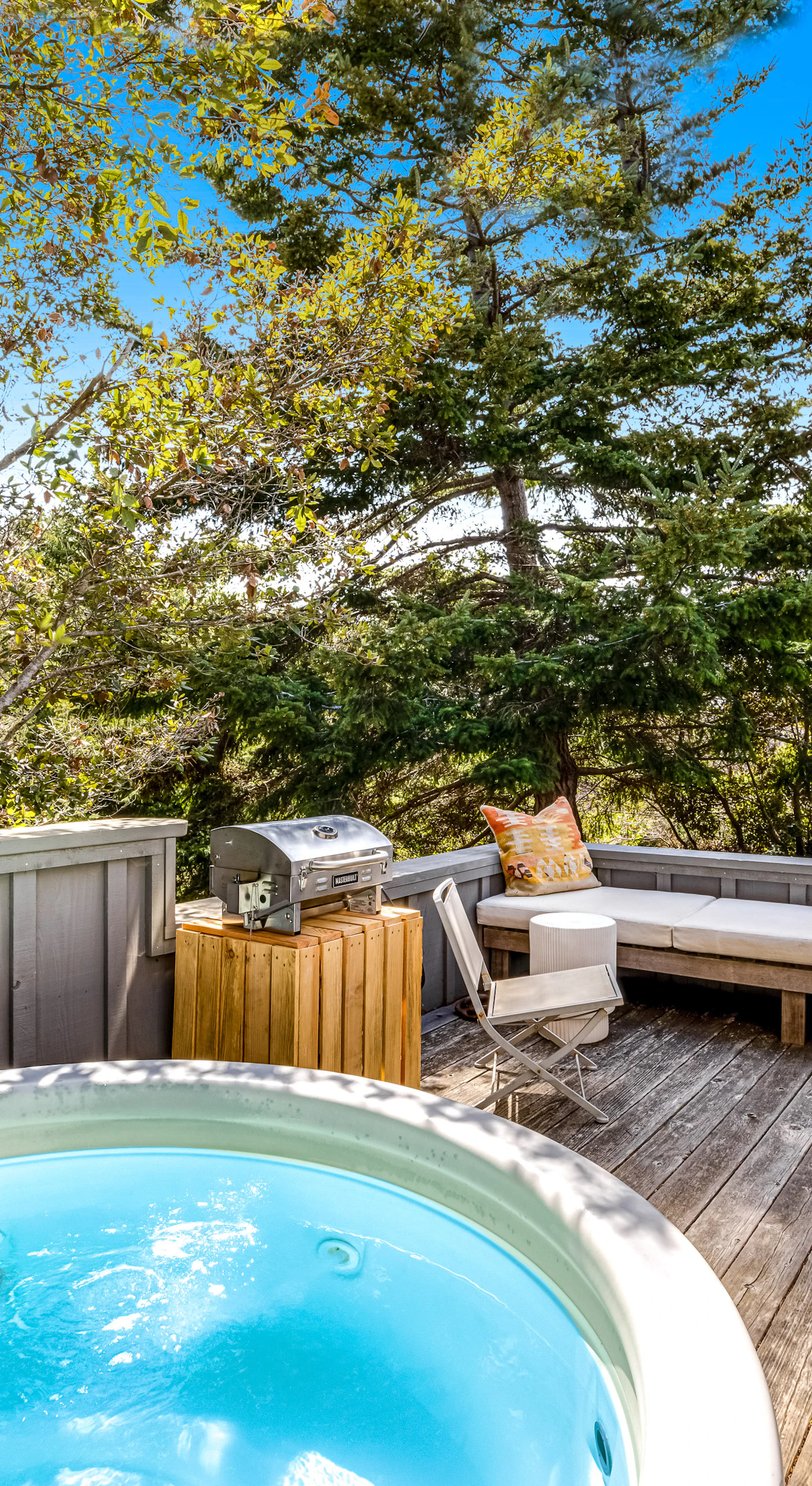 Step into your private hot tub oasis, where tranquility and nature surround you, perfect for unwinding after a day of adventures.