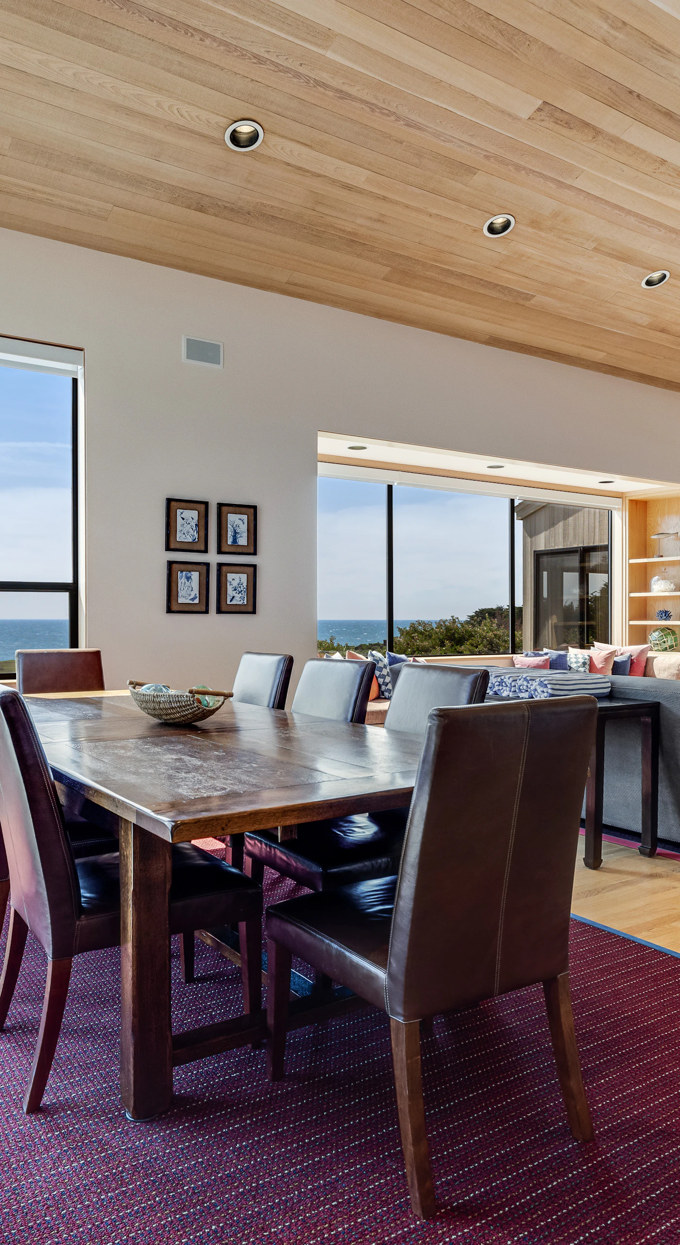 Share memorable meals in this elegant dining space, where the ocean view enhances every gathering with family and friends.
