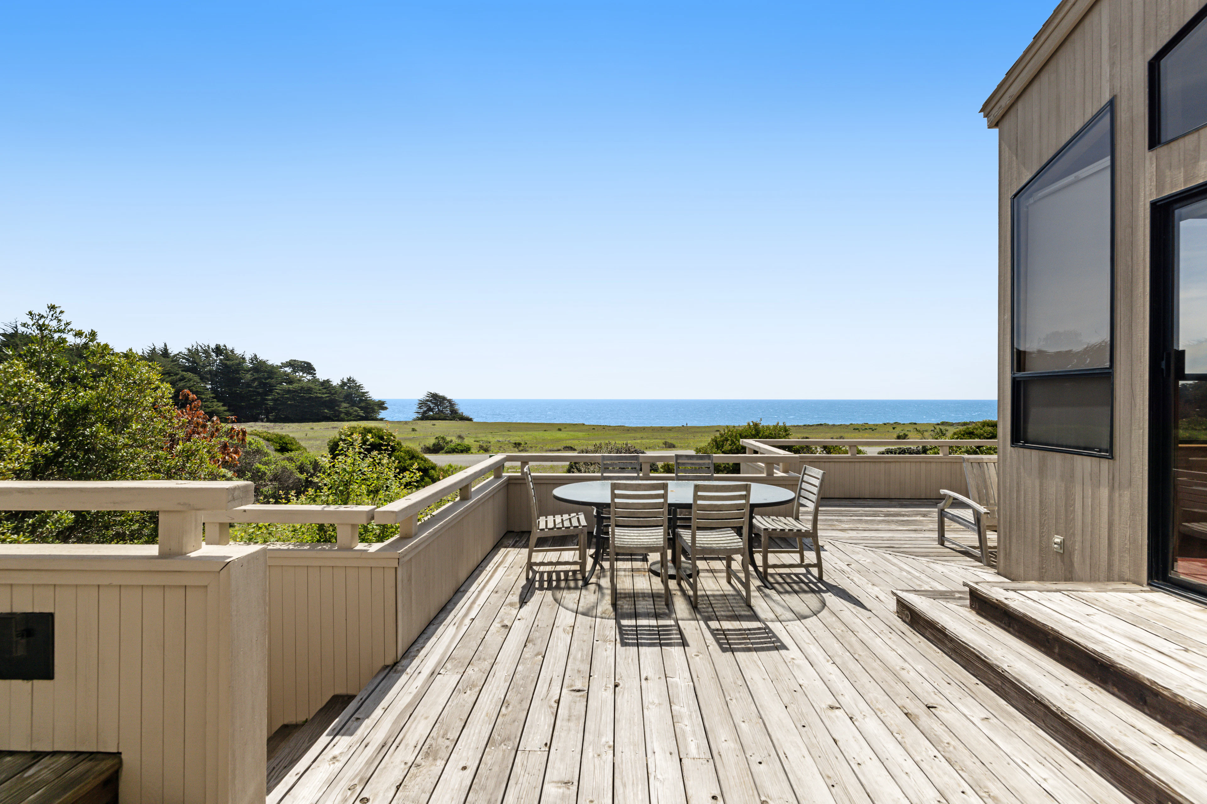 Embrace relaxation in your private hot tub on the deck, surrounded by nature, making it a perfect spot to unwind after a day of adventure.