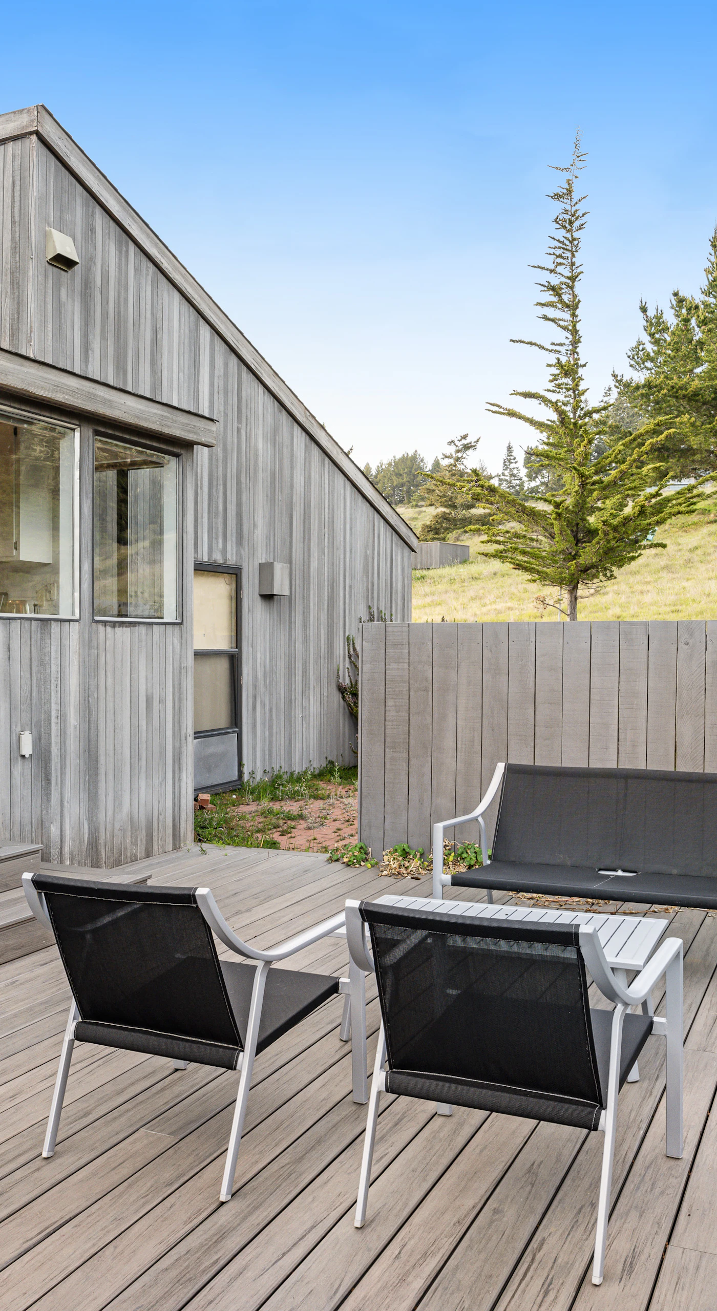Step outside to your private deck, the perfect spot for morning coffee as you embrace the tranquility of nature.