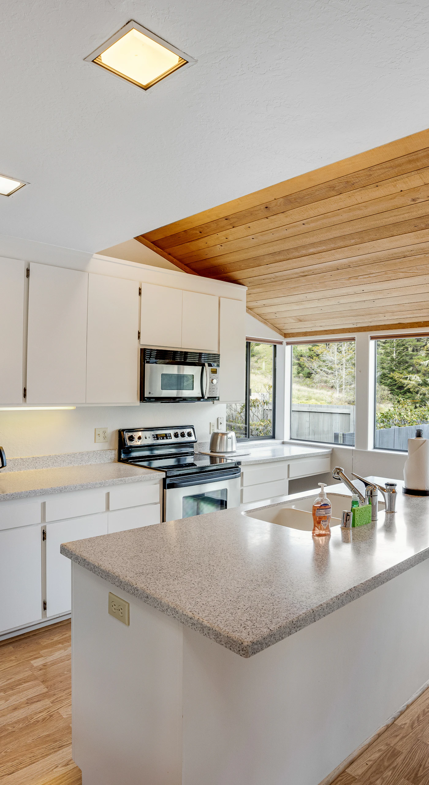 Cook up coastal-inspired meals in a well-equipped kitchen, with views that inspire culinary creativity.