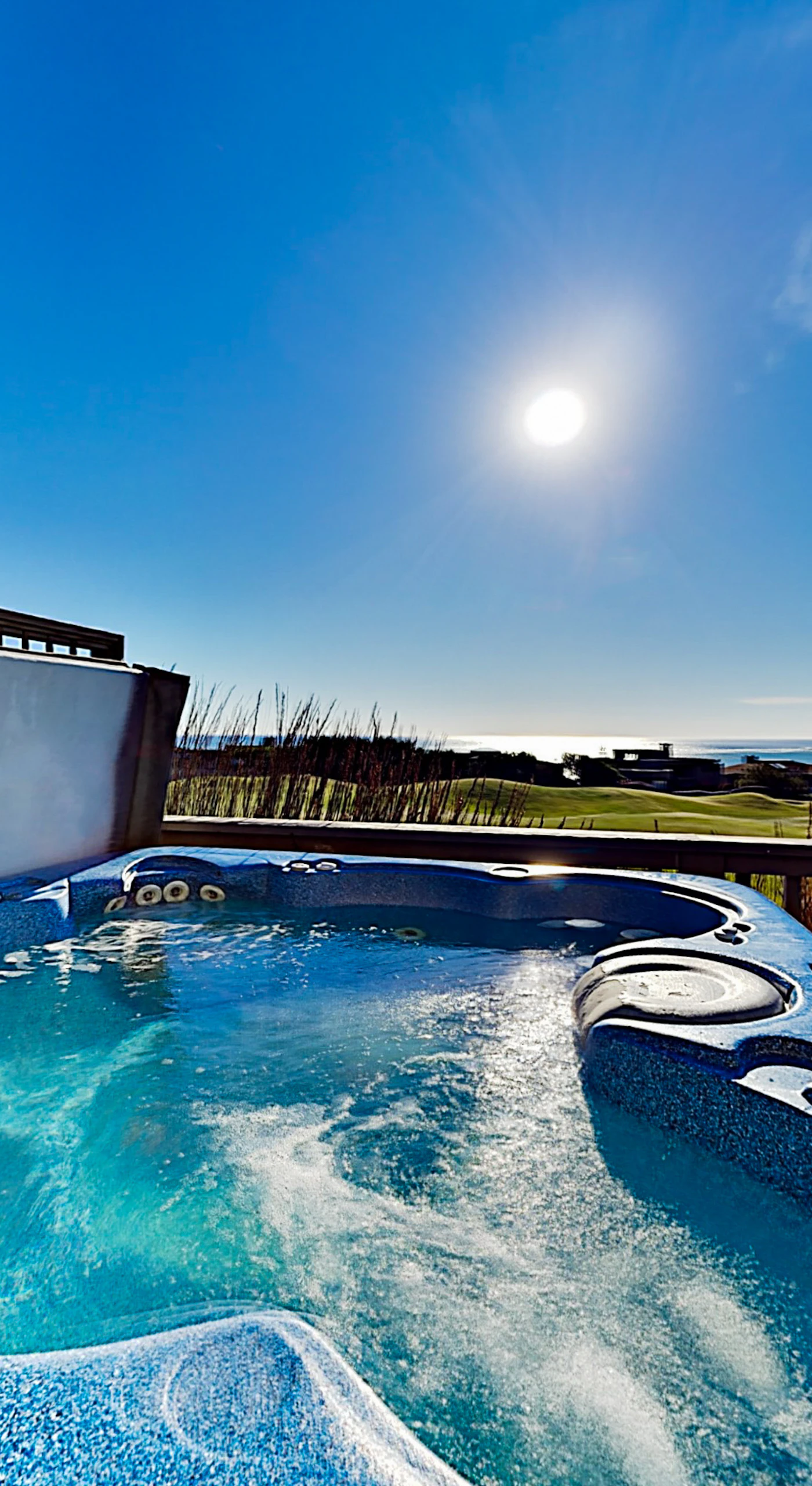 Soak in your private hot tub perched above the Sonoma Coast — nothing between you and the Pacific horizon but fresh salt air and golden light.