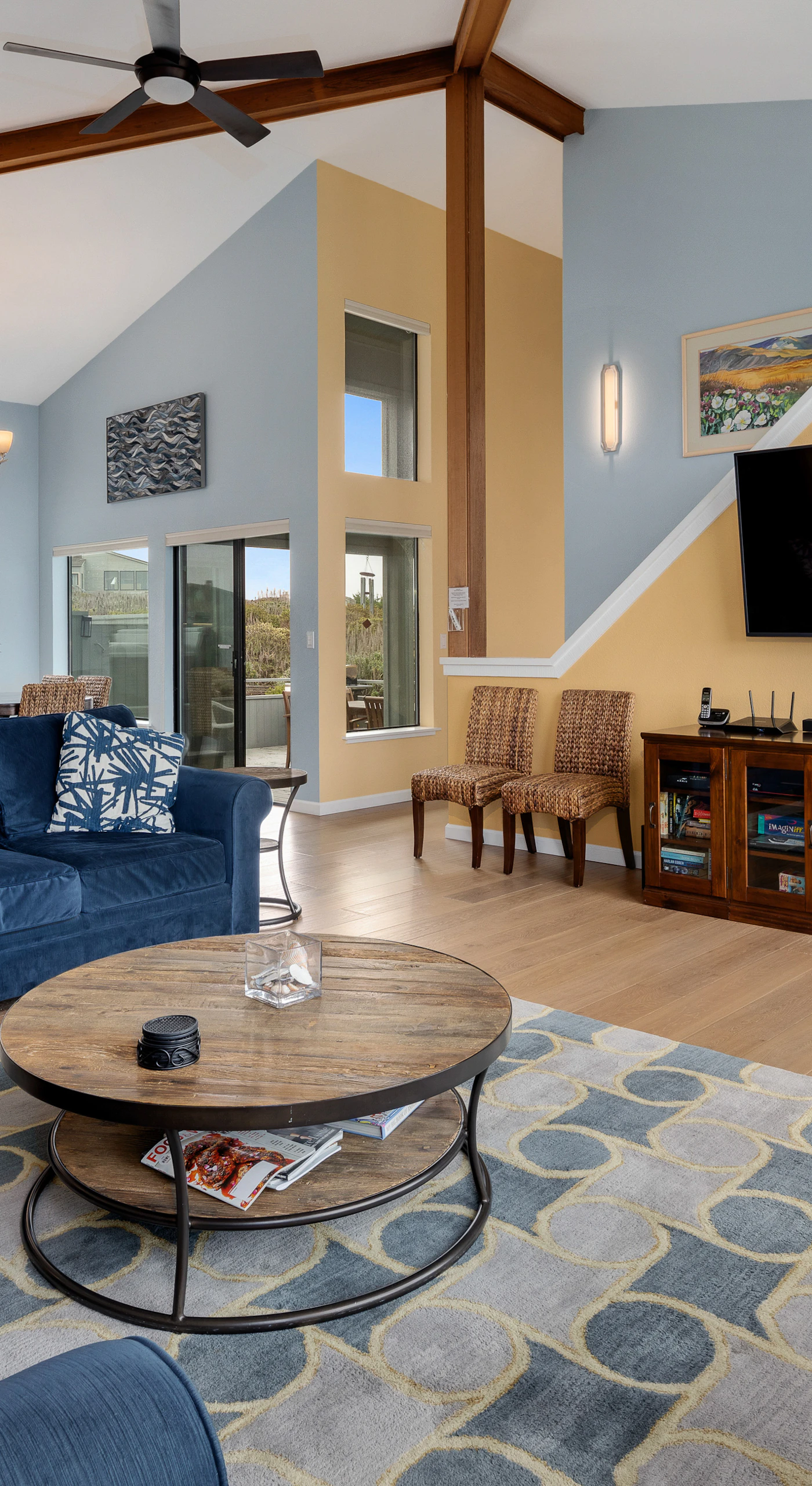 Gather around the wood-burning stove on cool coastal evenings while your favorite film plays on the big screen.