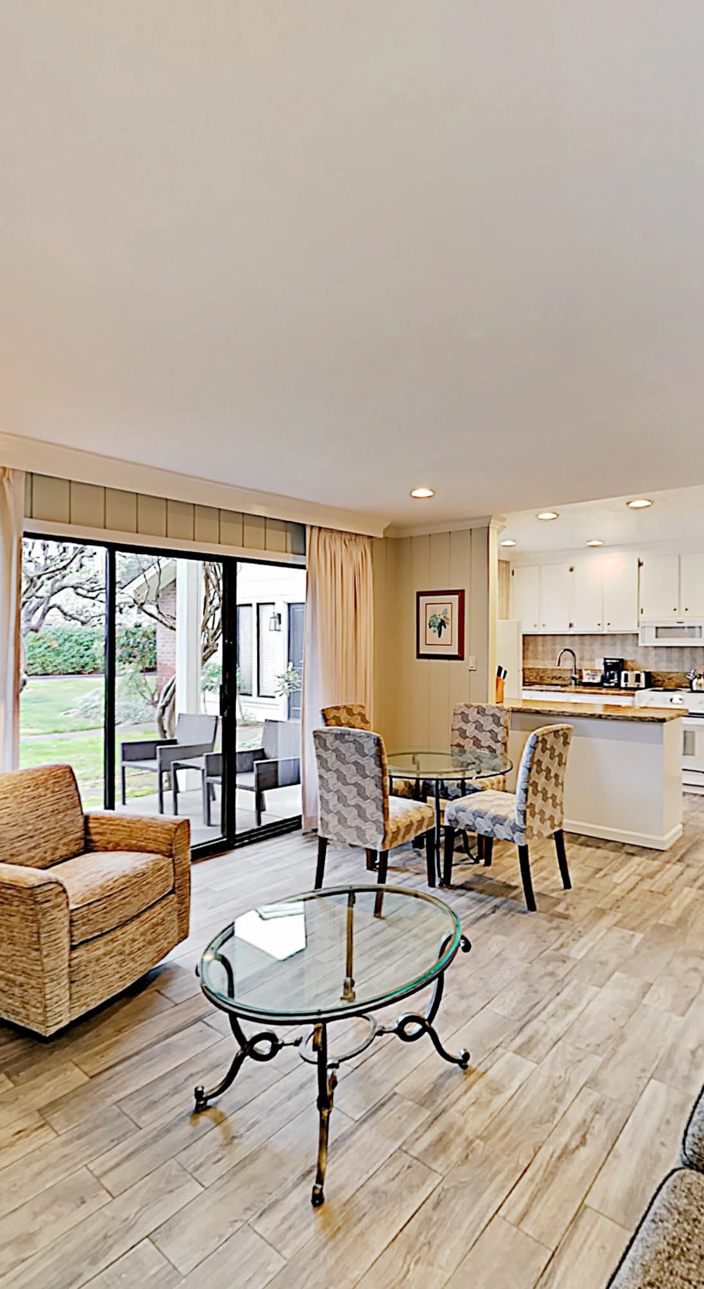 Settle into your Napa Valley retreat where a crackling fireplace, plush seating, and open-plan living invite you to unwind after a day of wine tasting.