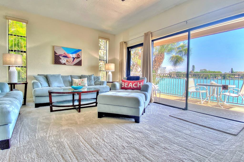 Coastal condo with multiple balconies and dock intracoastal waterway views — Treasure Island, FL — vacation rental
