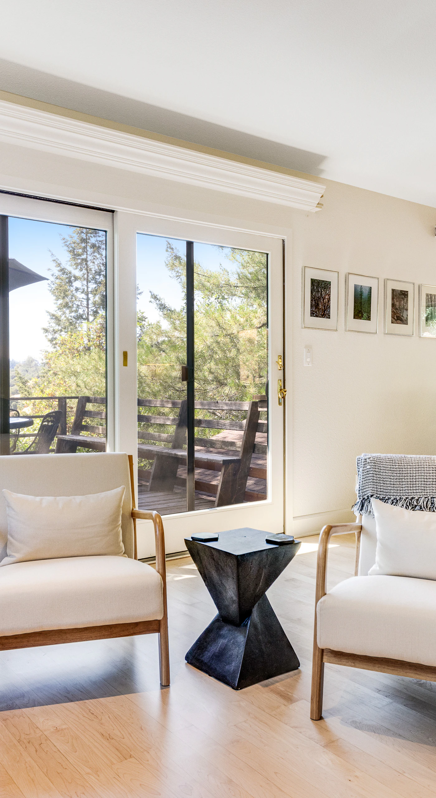 Gather your group in the open living and dining area where walls of glass reveal Sonoma County hillside views — an effortless setting for wine country entertaining.