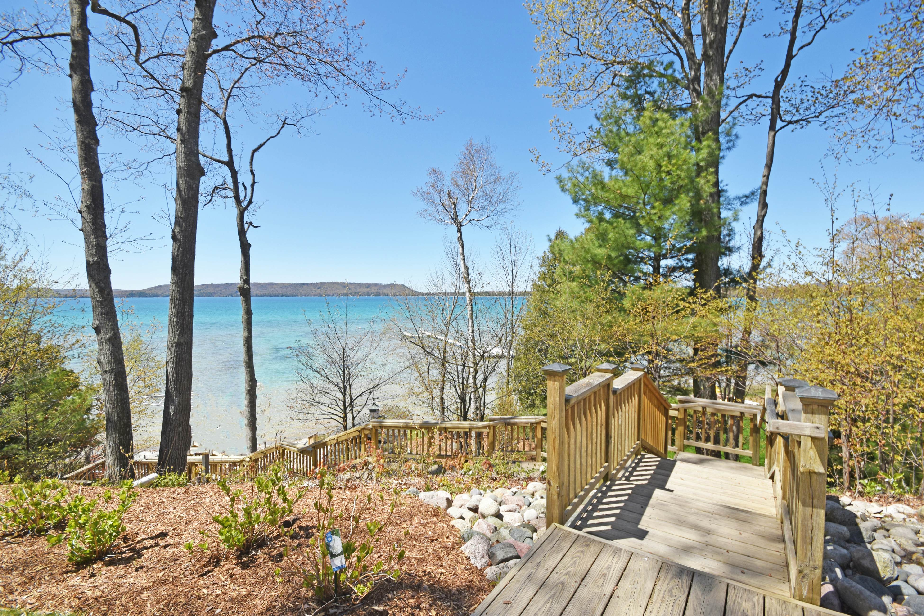 Snug Harbor 4 BD Maple City, MI Vacation Rental Vacasa