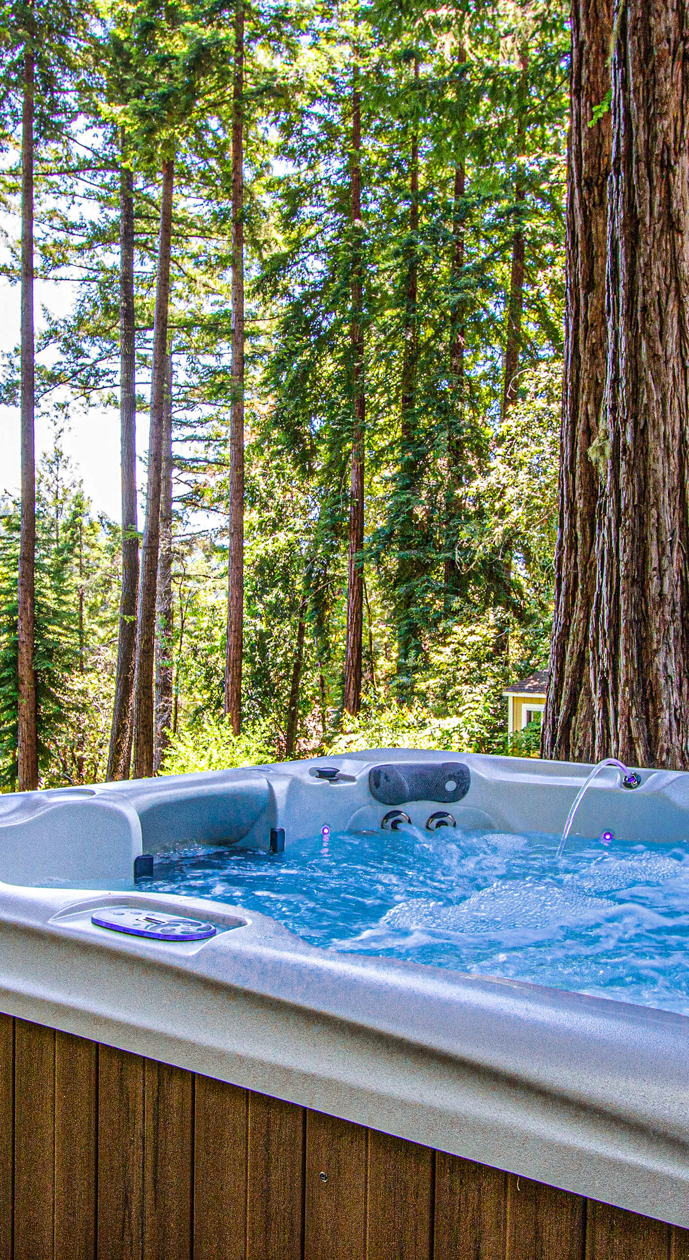 Soak away your wine country adventures in a private hot tub cradled by ancient redwood trunks — your own forest spa under the Sonoma sky.