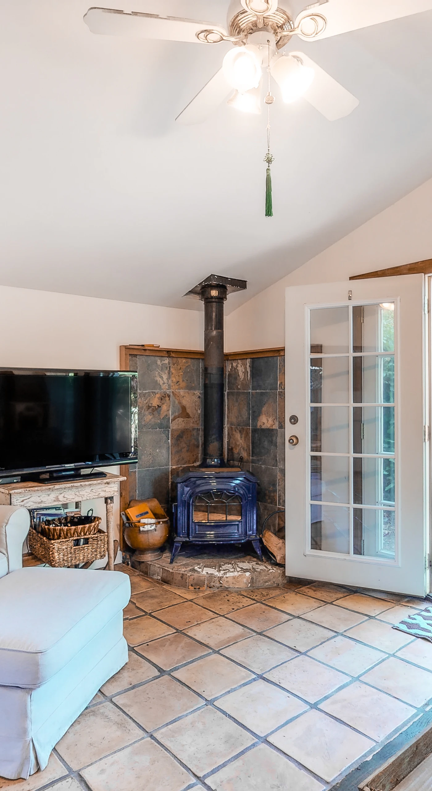 Cozy up by the wood-burning stove on cool vineyard evenings, then catch your favorite show on the flat-screen TV in this inviting living space.