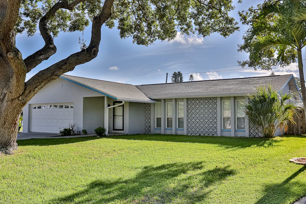 Modern coastal getaway with pool enclosed yard grill and outdoor bar — Largo, FL — vacation rental
