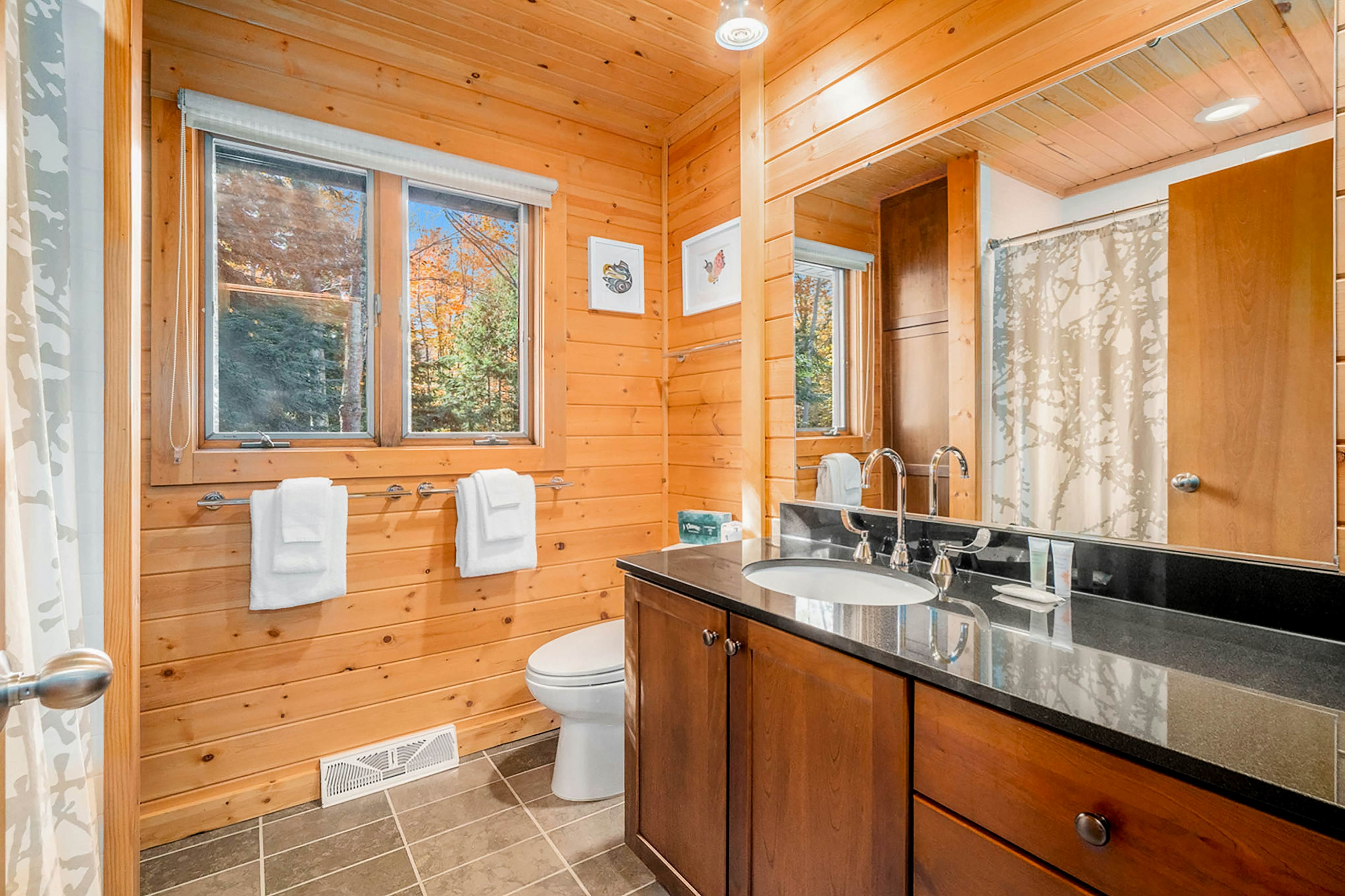 Deep Woods Modern 3 BD Honor, MI Vacation Rental Vacasa