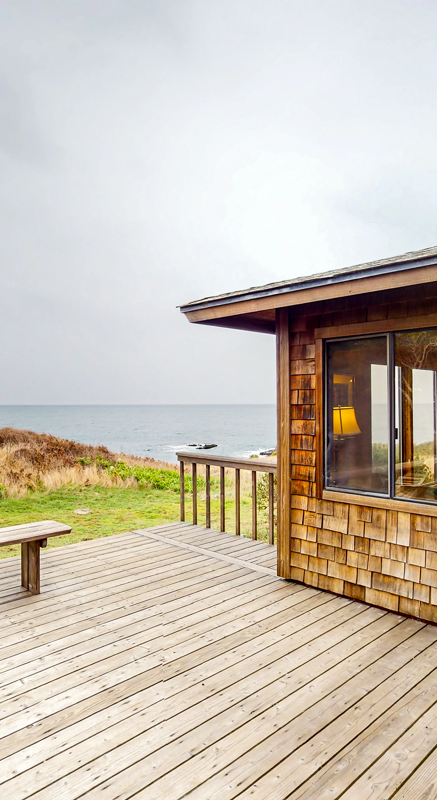 Breathe in the fresh coastal air on this spacious deck, where you can savor stunning ocean views and tranquil moments with loved ones.