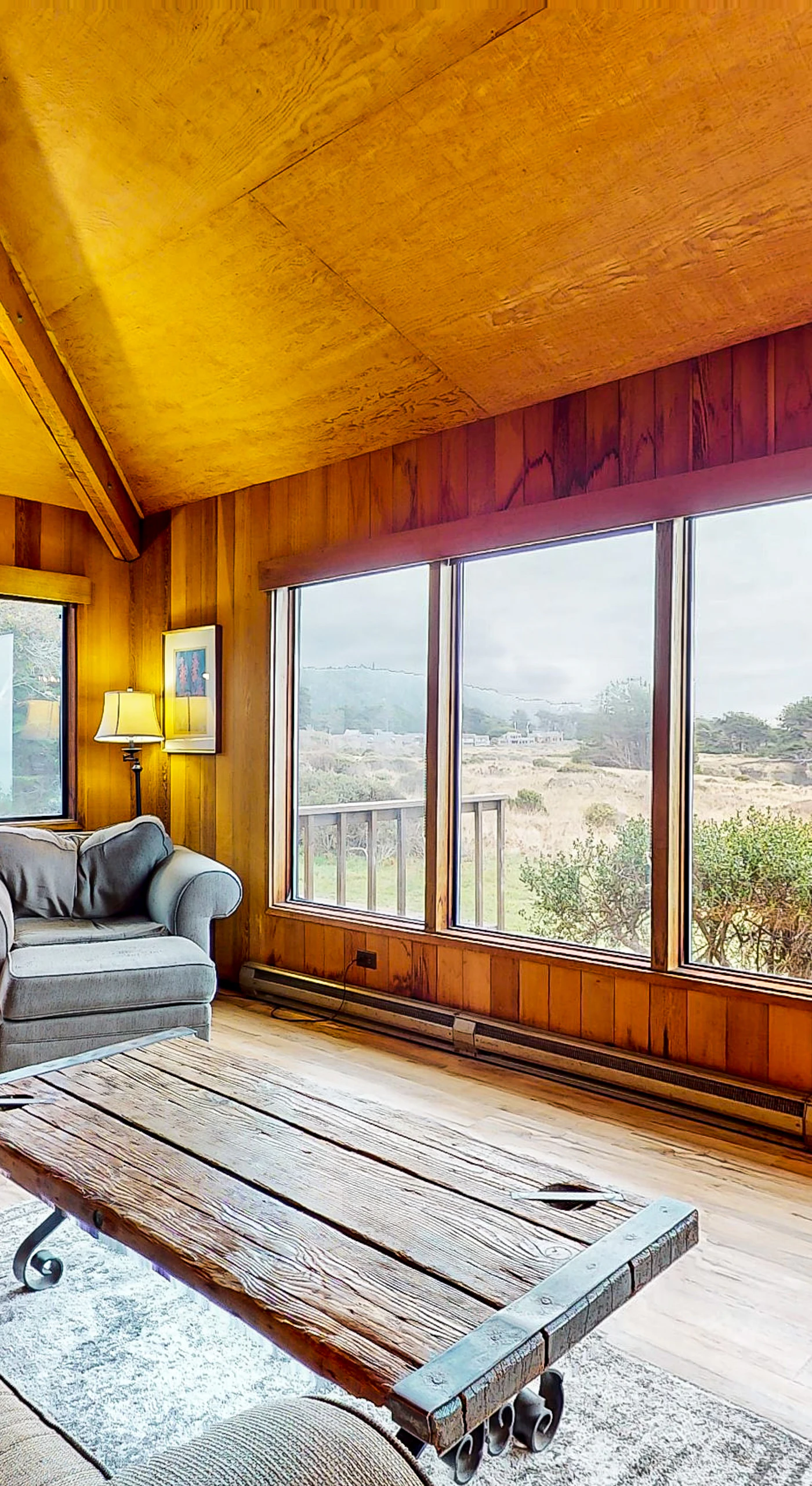 Cozy up by the wood-burning fireplace, where the ocean views invite you to unwind and create lasting memories.