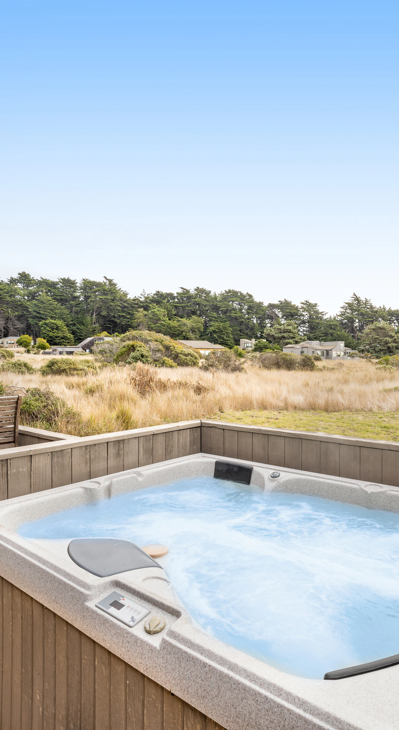 After a day of exploring, unwind in your private hot tub, soaking in the tranquil surroundings as the sun sets over the horizon.