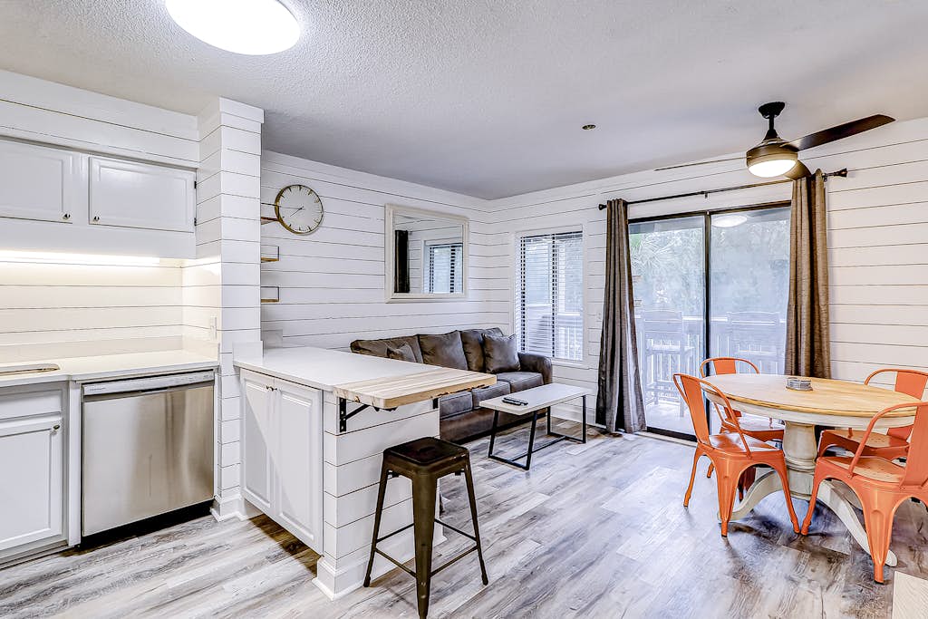 Modern condo with water views, central air-conditioning, shared pool, & hot tub — Hilton Head, SC — vacation rental