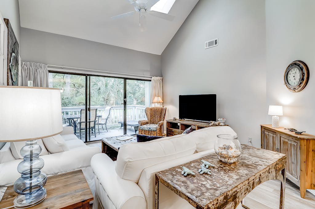 Sun-kissed bliss at Colonnade Club with dual suites, deck, shared pool, hot tub — Hilton Head, SC — vacation rental