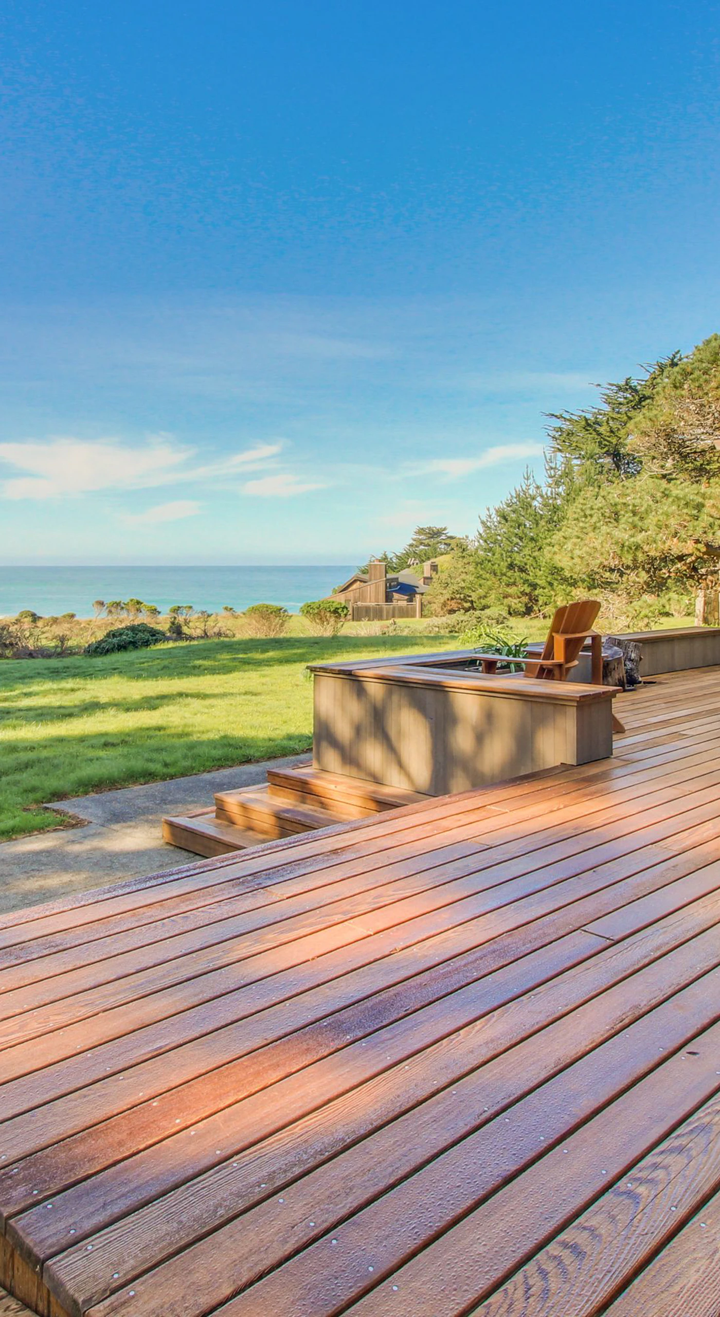 The outdoor deck invites you to savor sunset views, equipped for leisurely evenings or lively gatherings with loved ones.