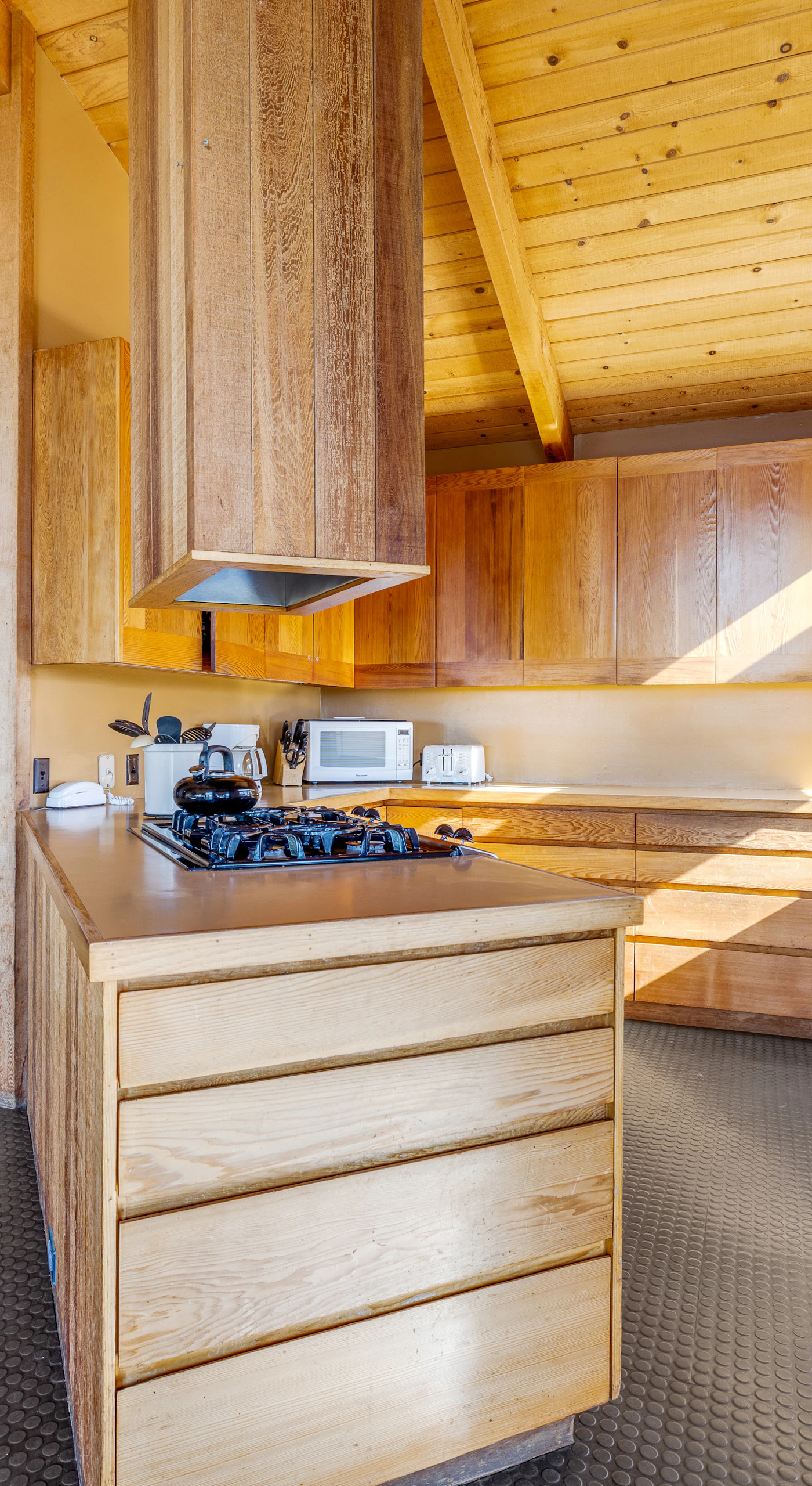 Unleash your inner chef in this spacious kitchen, where natural light and modern amenities inspire culinary creativity.