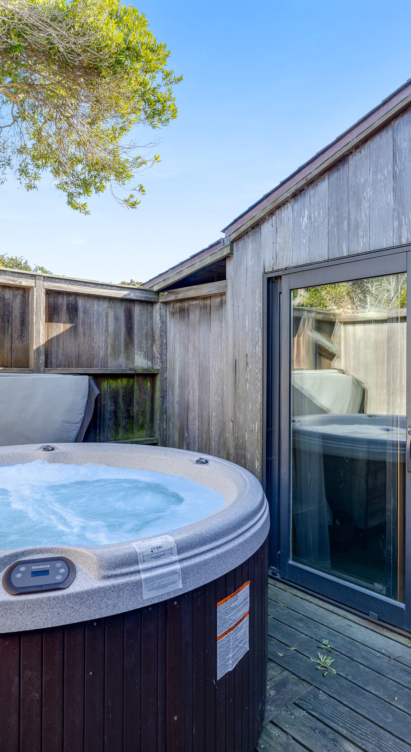 Your private hot tub awaits! Imagine soaking under the stars after a day of adventure, surrounded by the soothing sounds of nature.