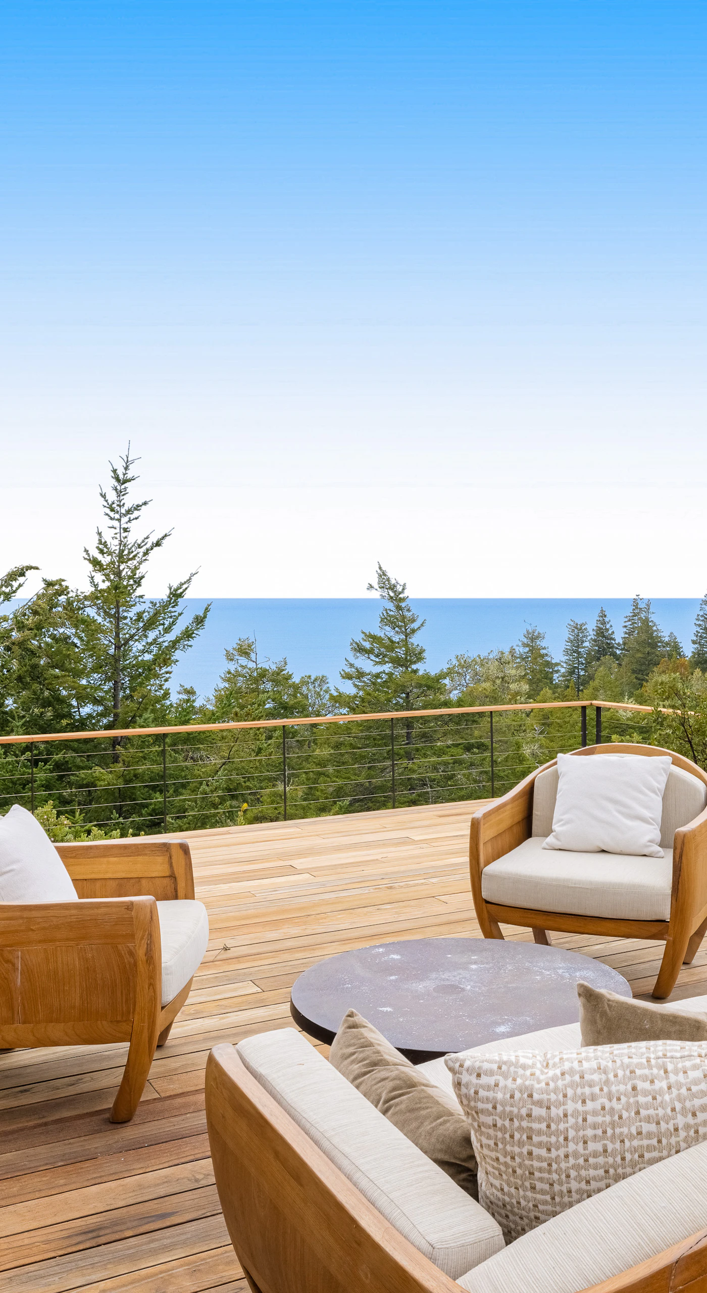 Breathe in the fresh coastal air from your spacious deck, where ocean views set the perfect backdrop for morning coffee or evening stargazing.